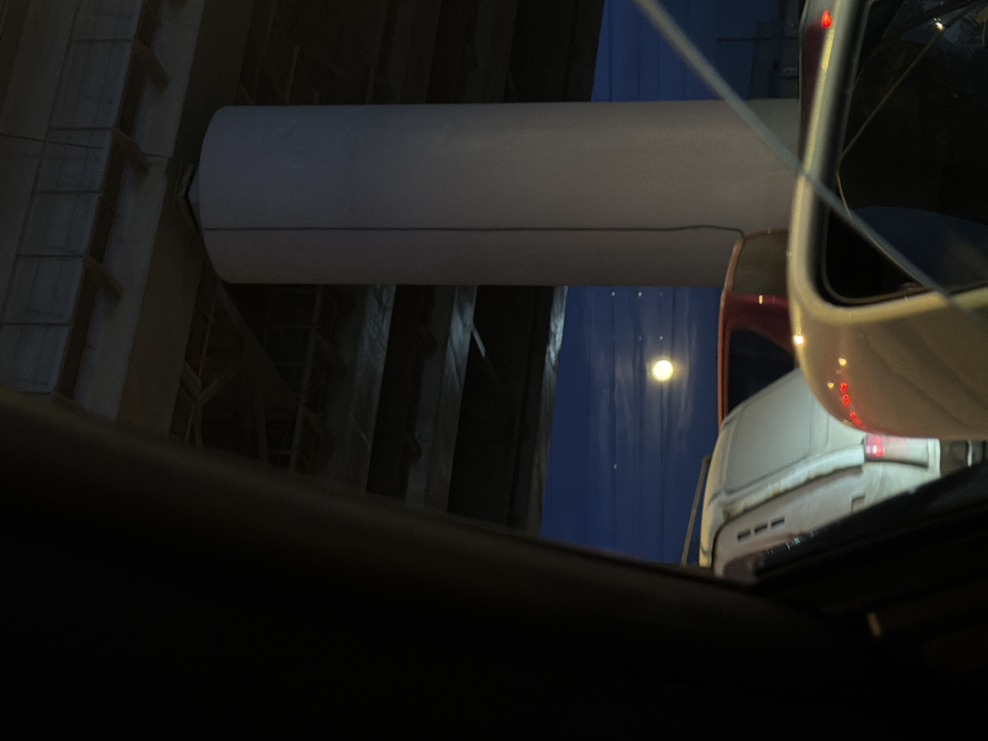 White van parked under bridge in Moscow