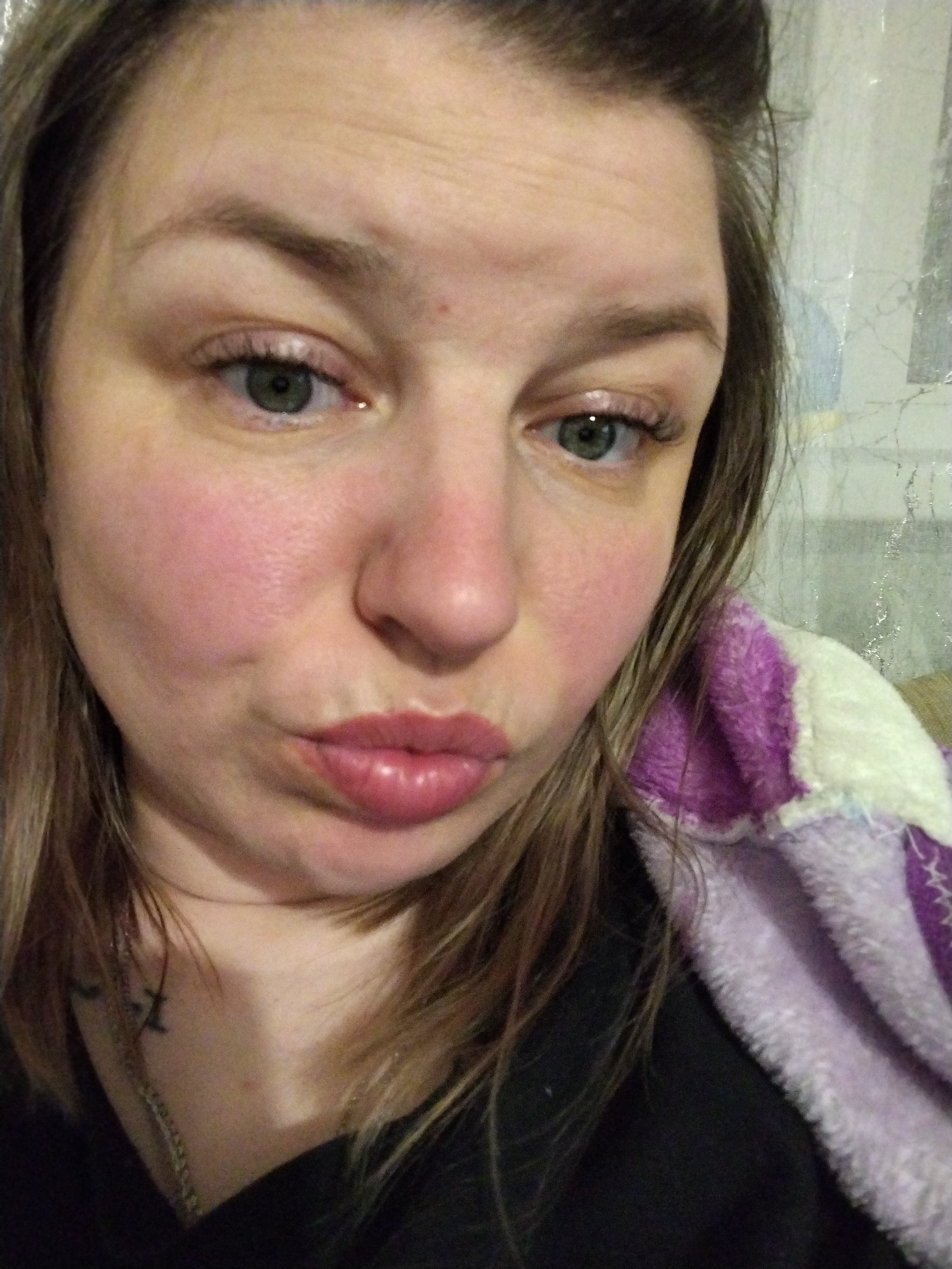 Woman takes selfie with blanket in Yaroslavl
