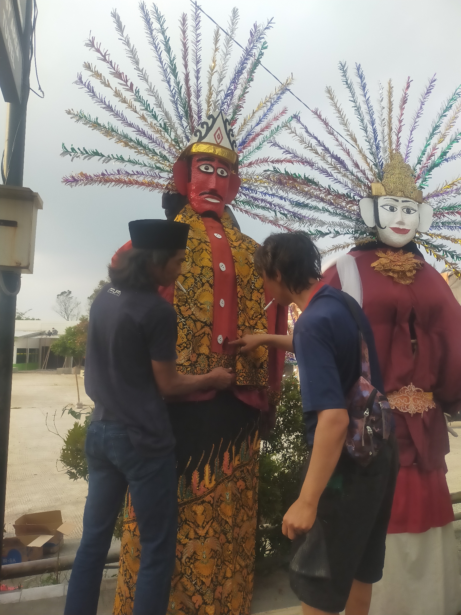 Ogoh-ogoh procession moves through the streets of Tuwel