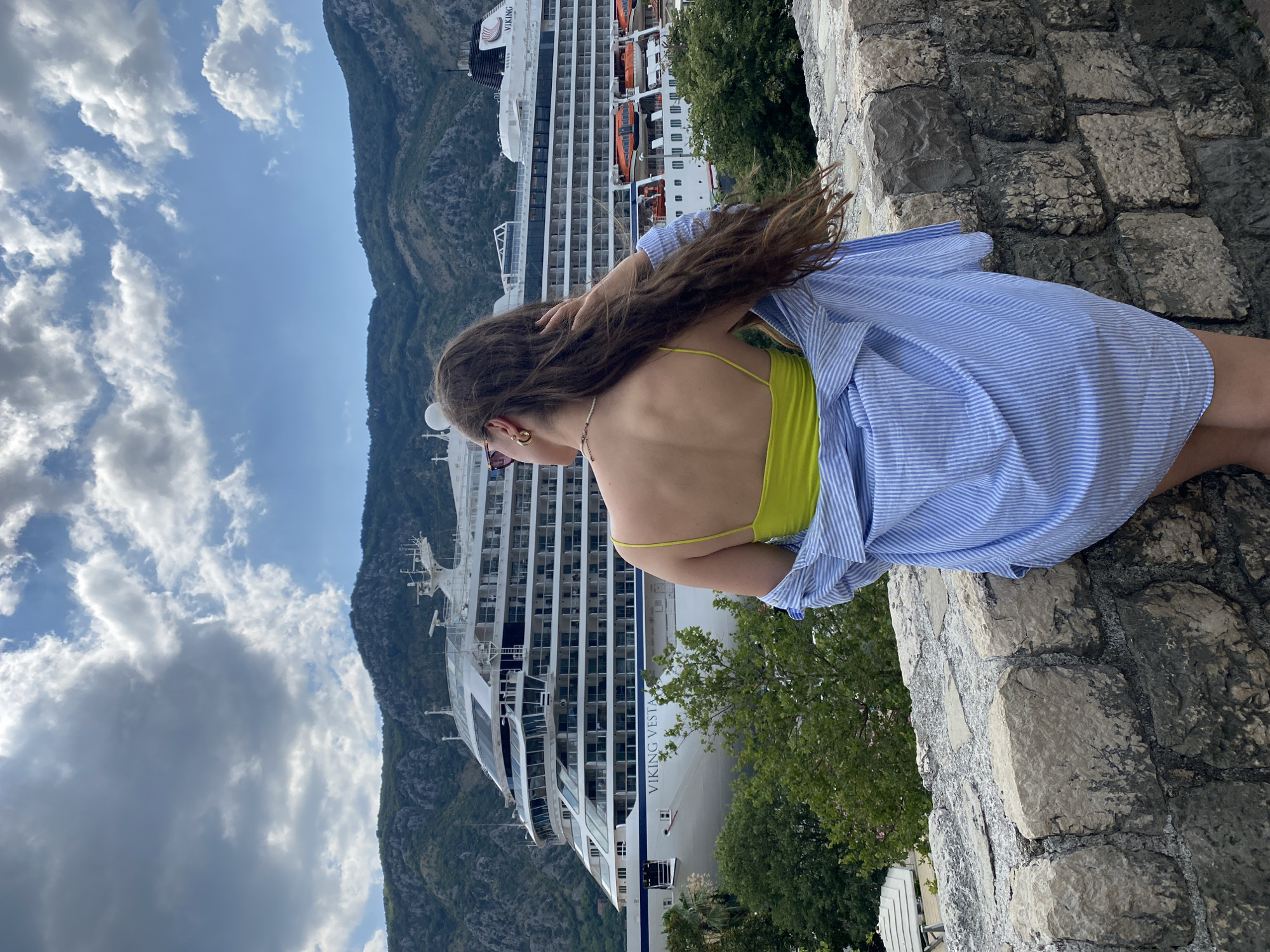 Kotor Bay waterfront: cruise ship, canal ducks, marina boats