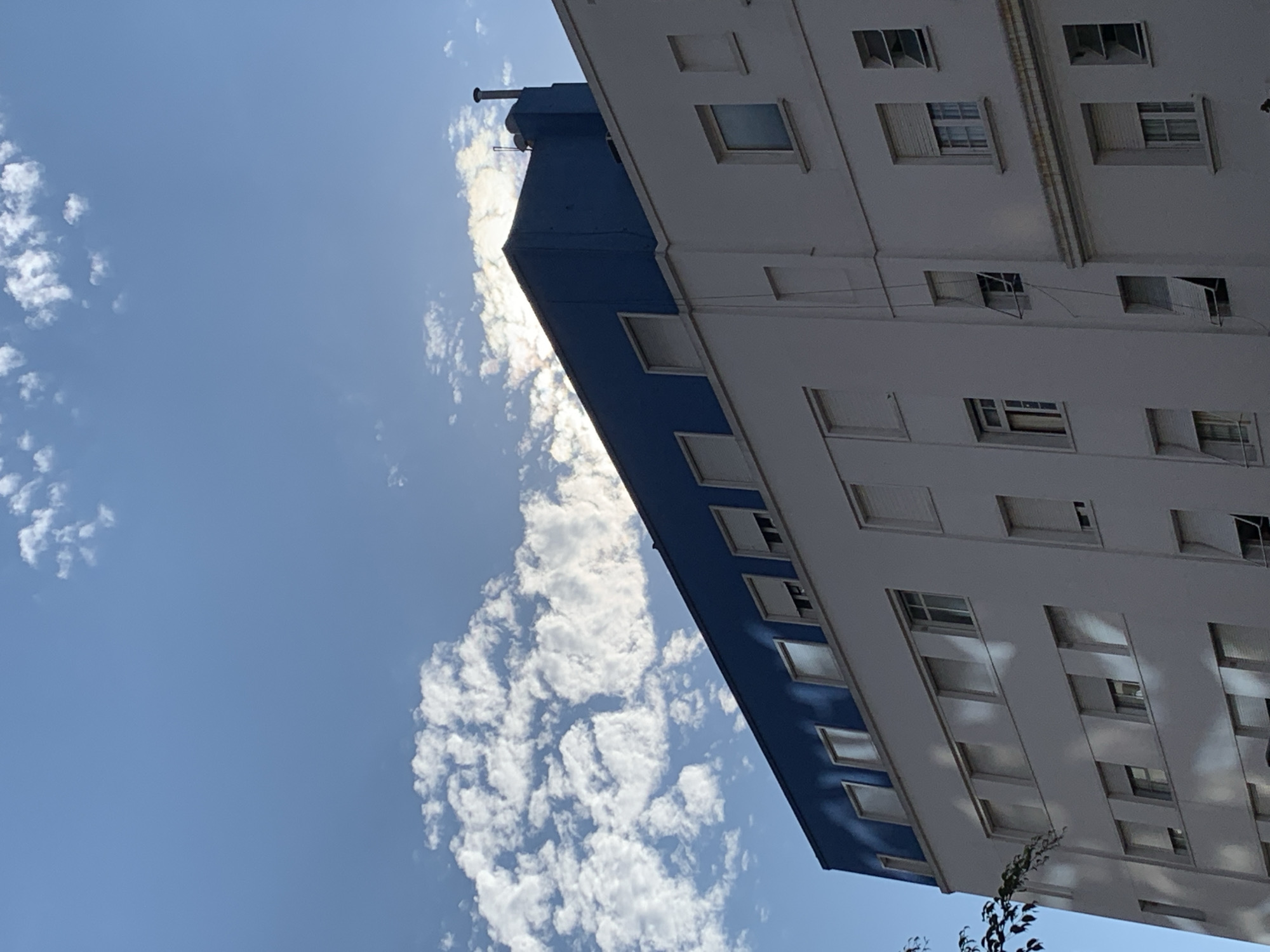 Tall building photographed against cloudy sky in Buenos Aires