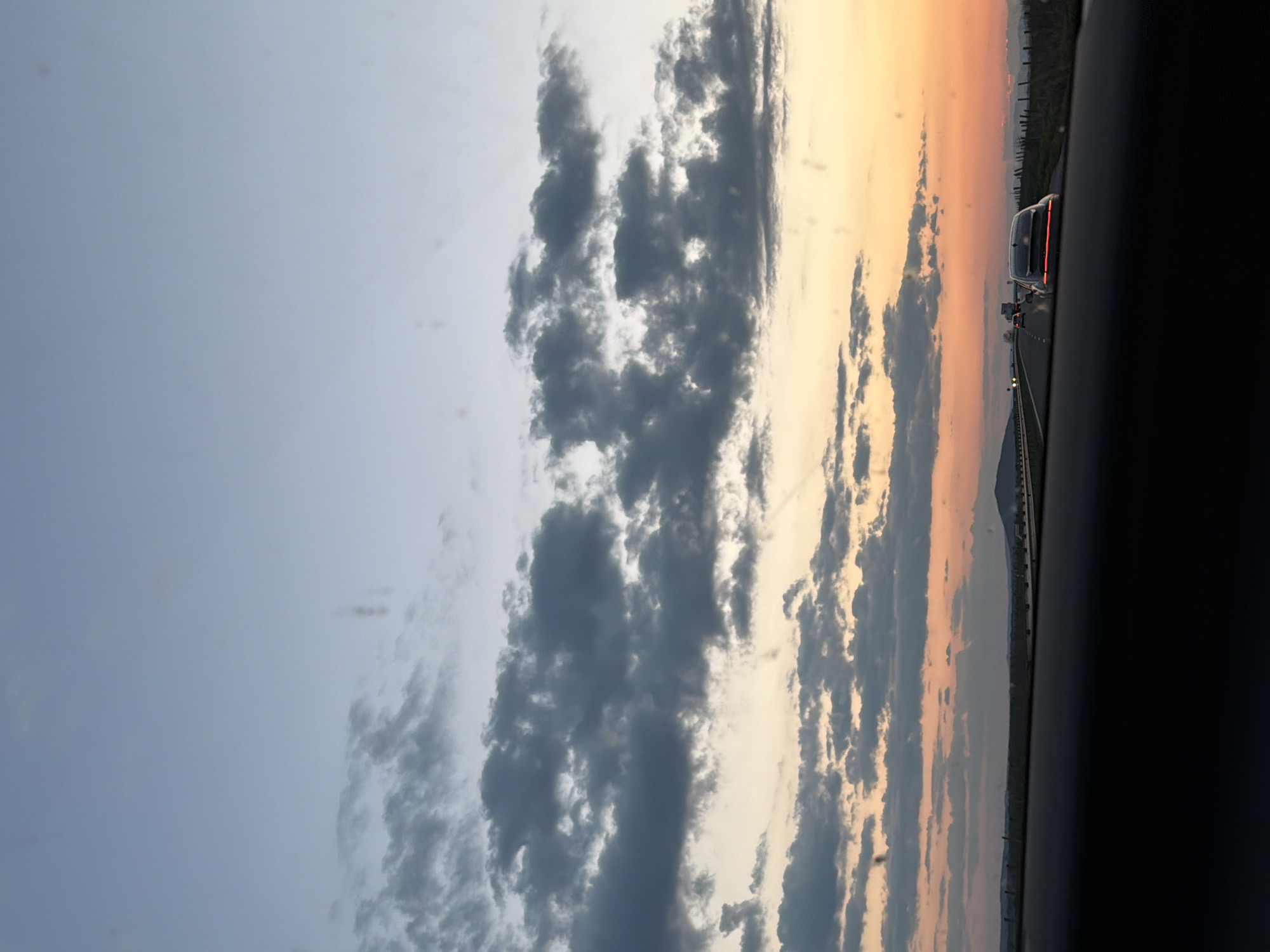 Highway travel captured near Veselinovo during evening sky transition