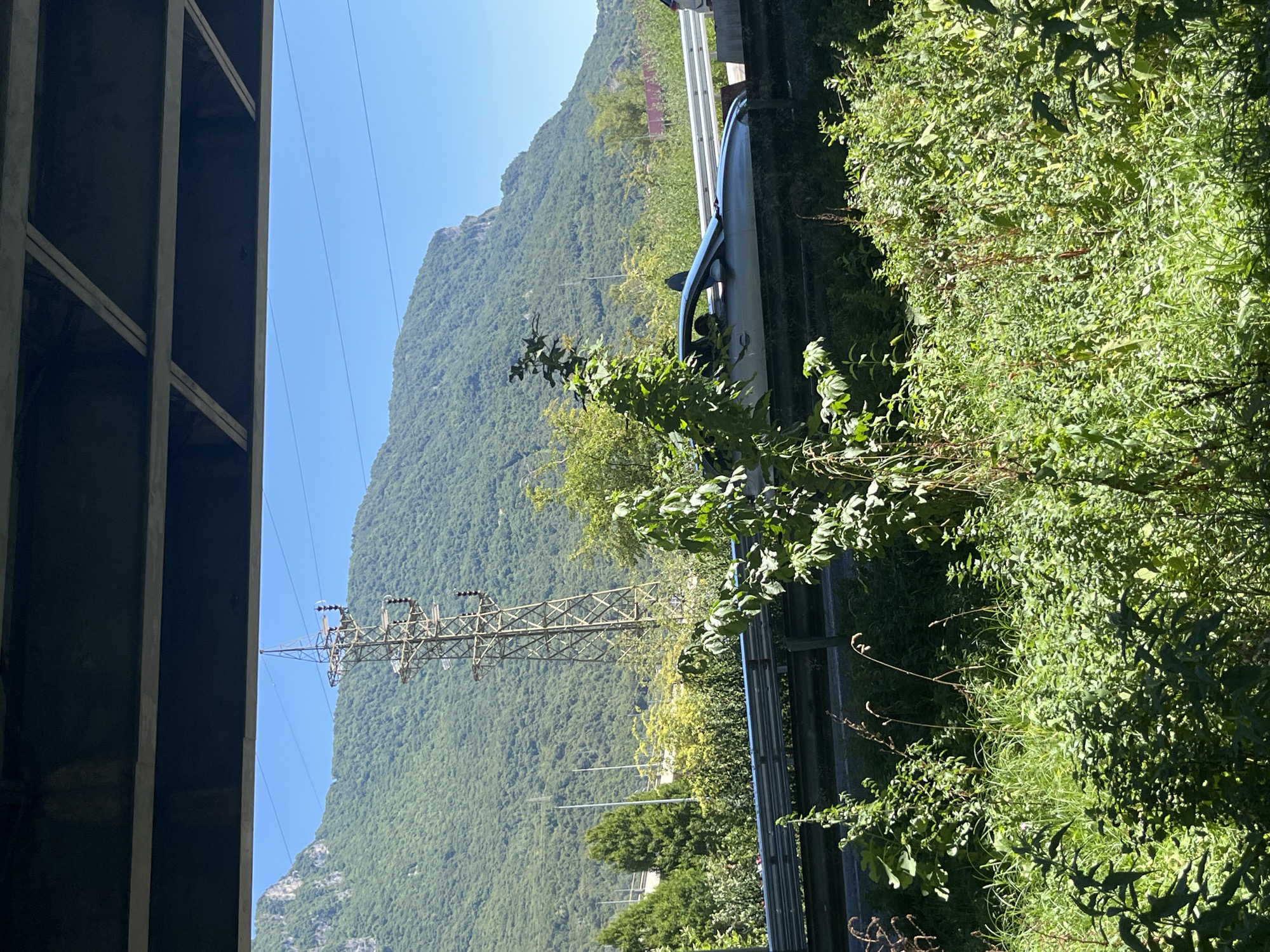 Lakeside and mountain roads around Lecco on a clear summer day