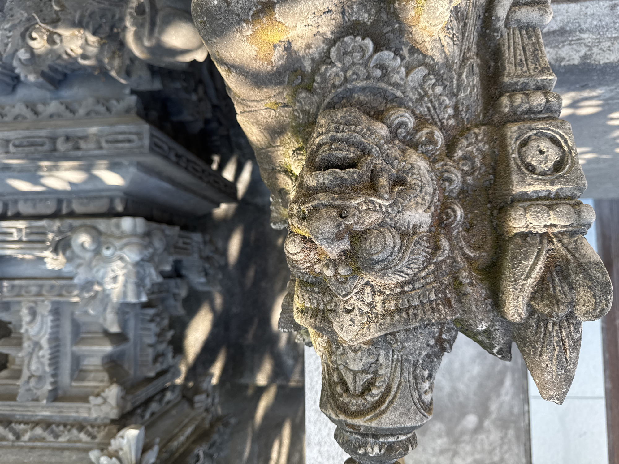 Traditional Balinese temple carvings documented in Kubu, Indonesia