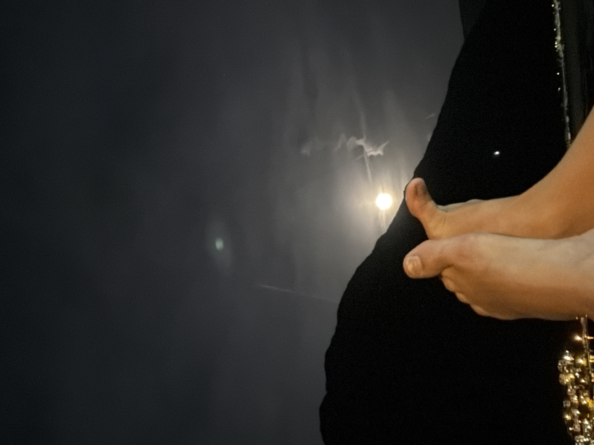 Couple enjoys moonlit evening on Bay of Kotor waterfront