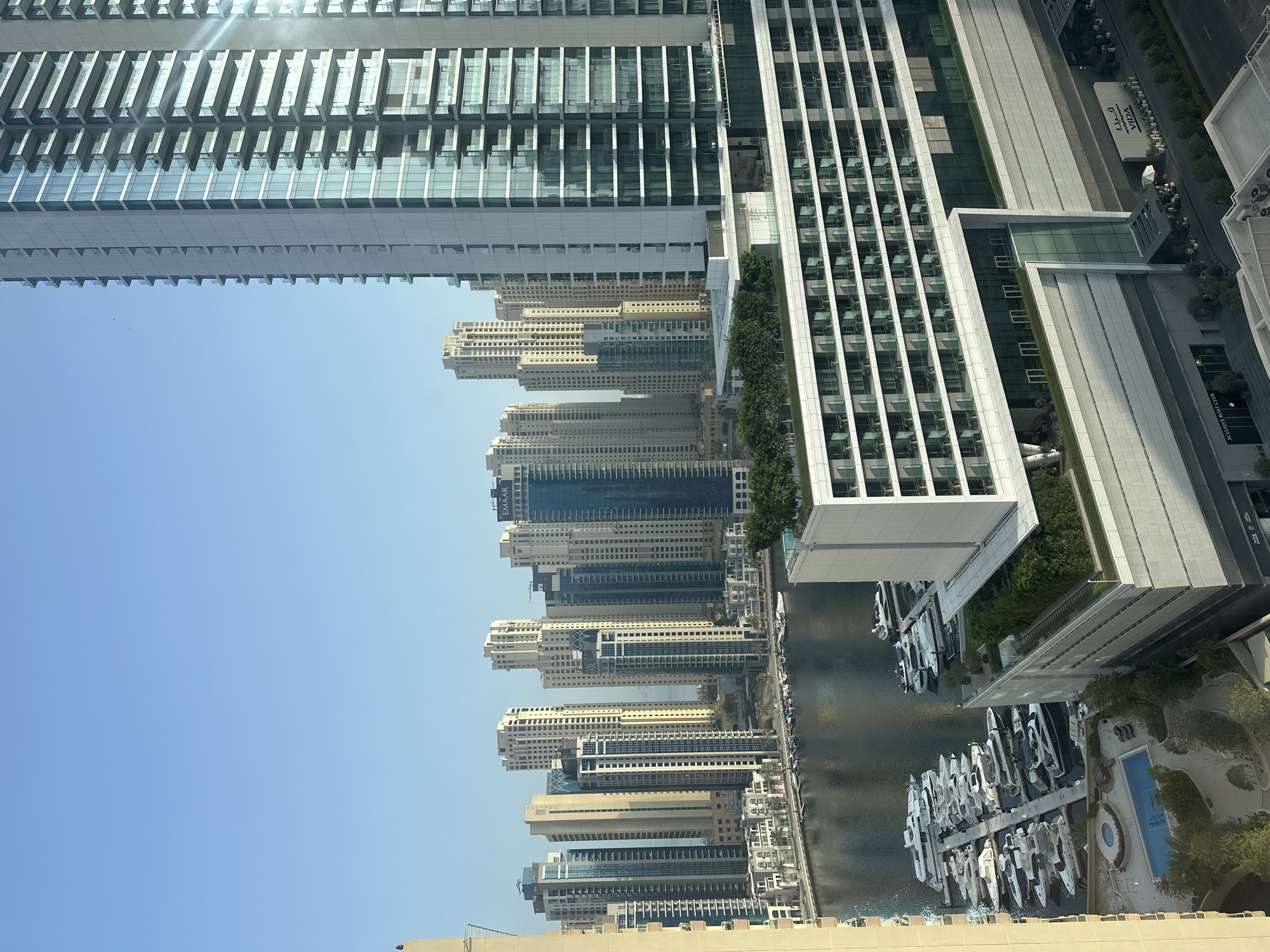 Dubai Marina skyline views with an electrolyte drink in hand