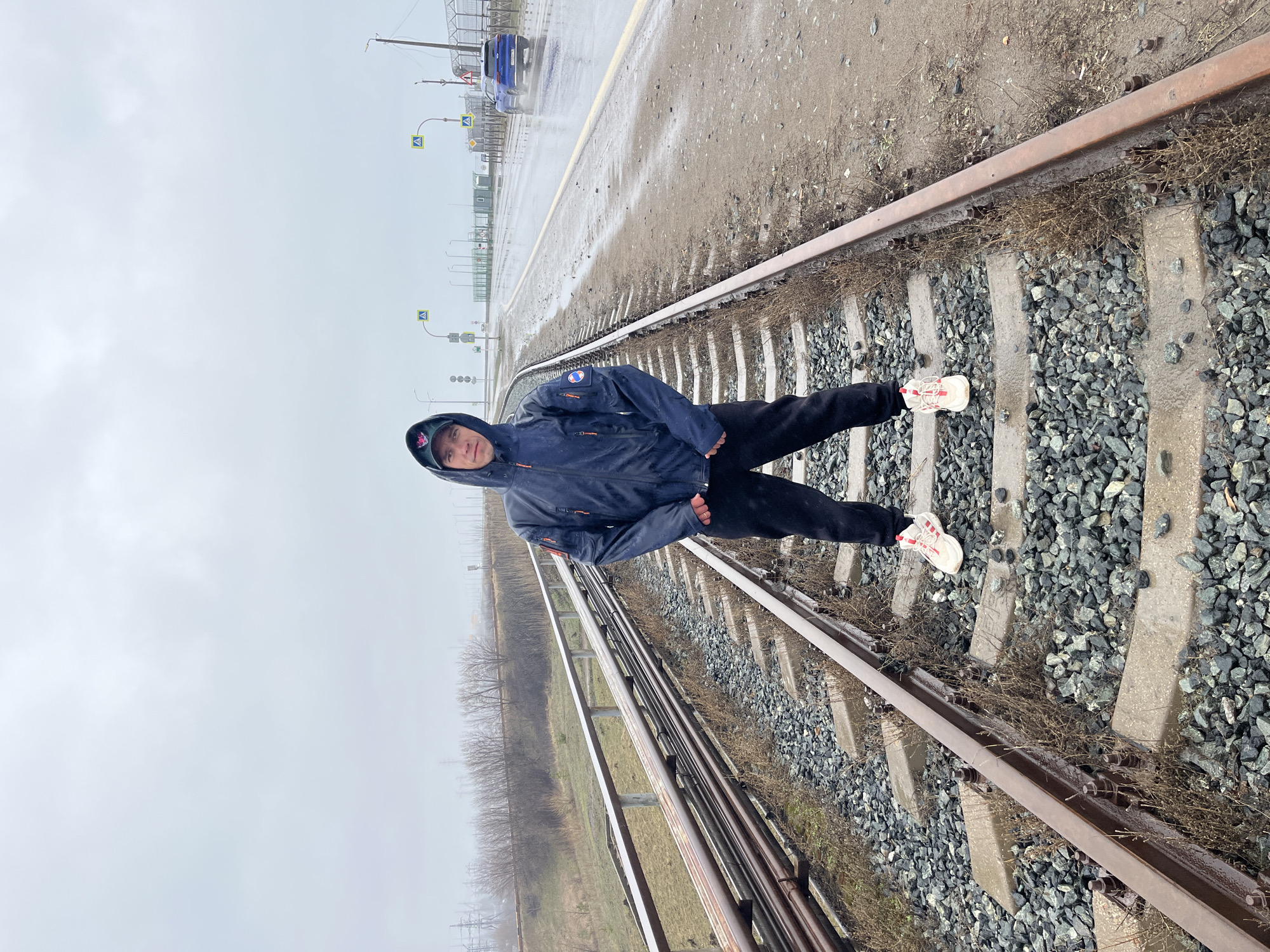 Person photographed at railway site in Chaikovsky, Russia