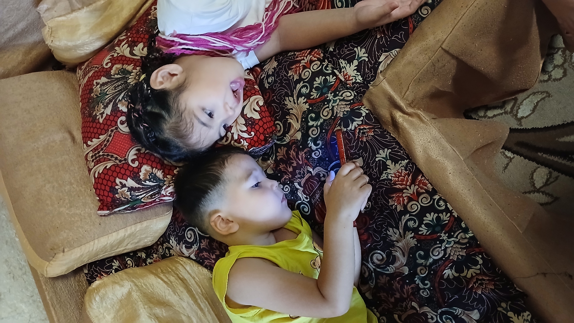 Quiet indoor moments: couch lounging and a curtain peek