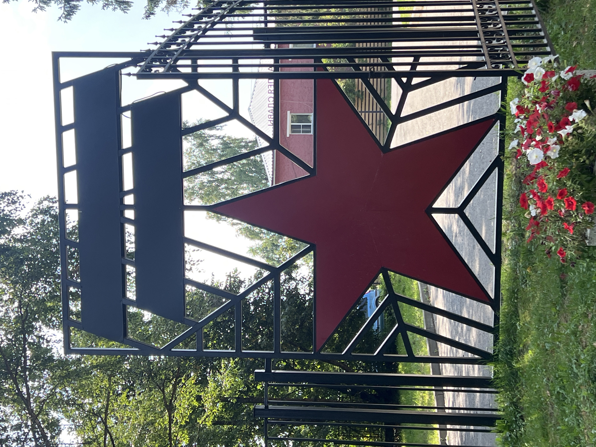 Taldom's civic park: Soviet gate, fountain, and cypress promenade
