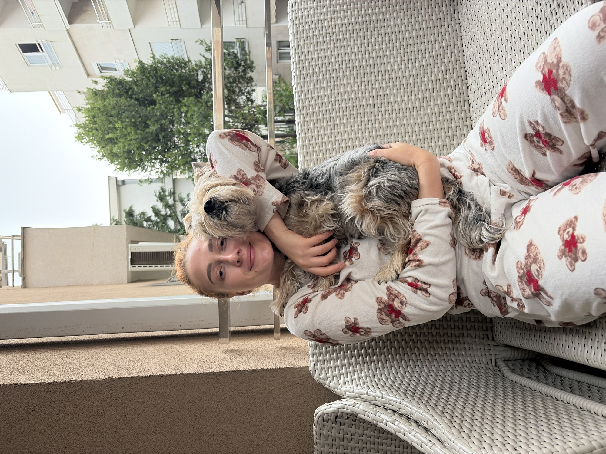Couple enjoys quiet afternoon at Budva home with fruit, pets