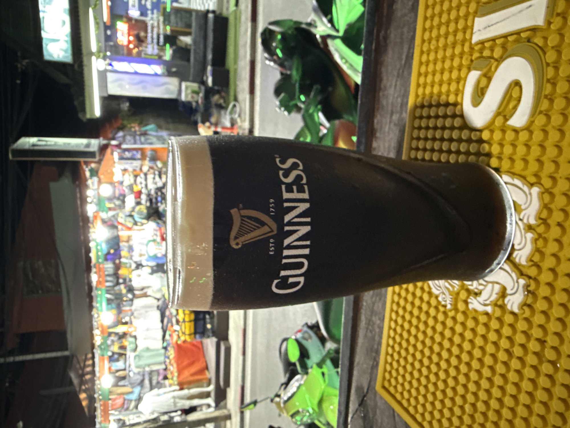 Guinness beer spotted on decorative bar mat in Thailand