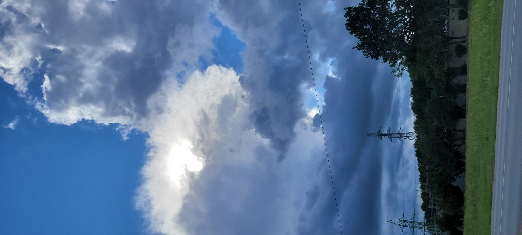 Riga infrastructure and street scenes under a dramatic July sky
