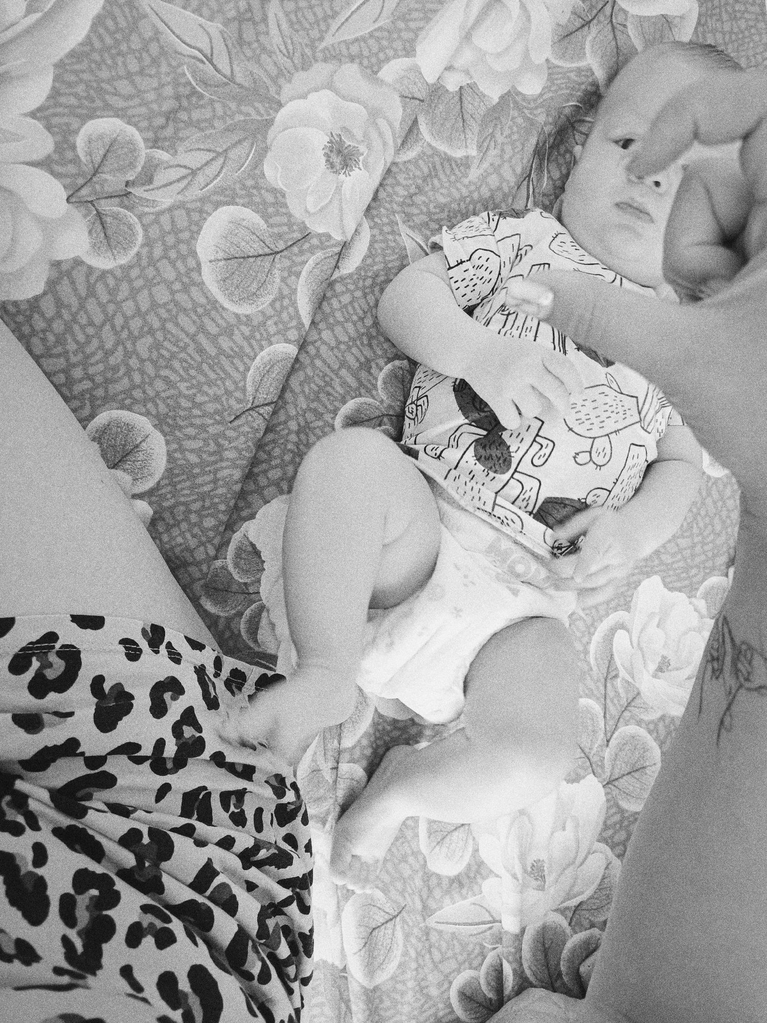 Early morning baby care moments documented in Tobolsk home