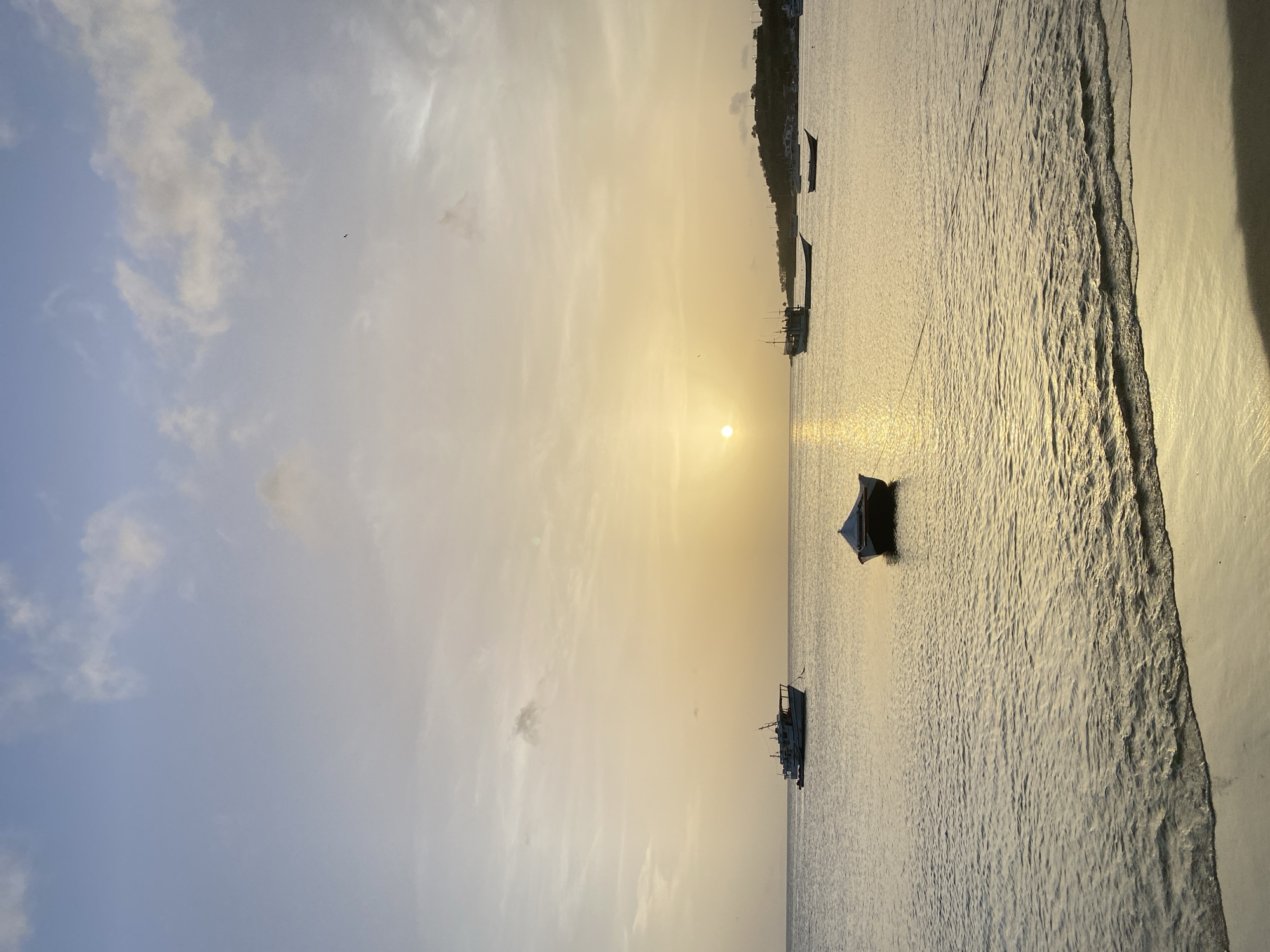 Golden hour on the Juan Griego waterfront, boats and all.