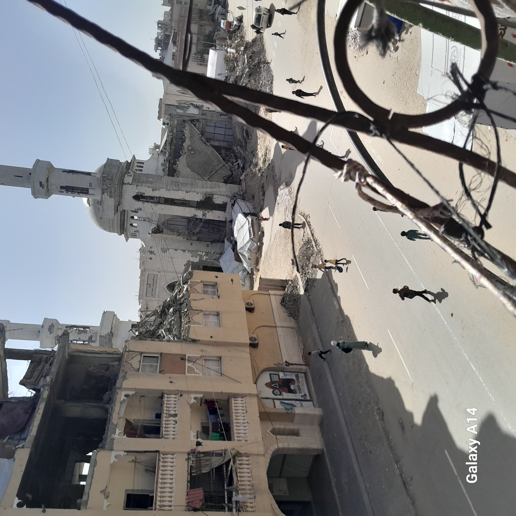 Khan Yunis resident documents damaged buildings, refugee camps, daily life