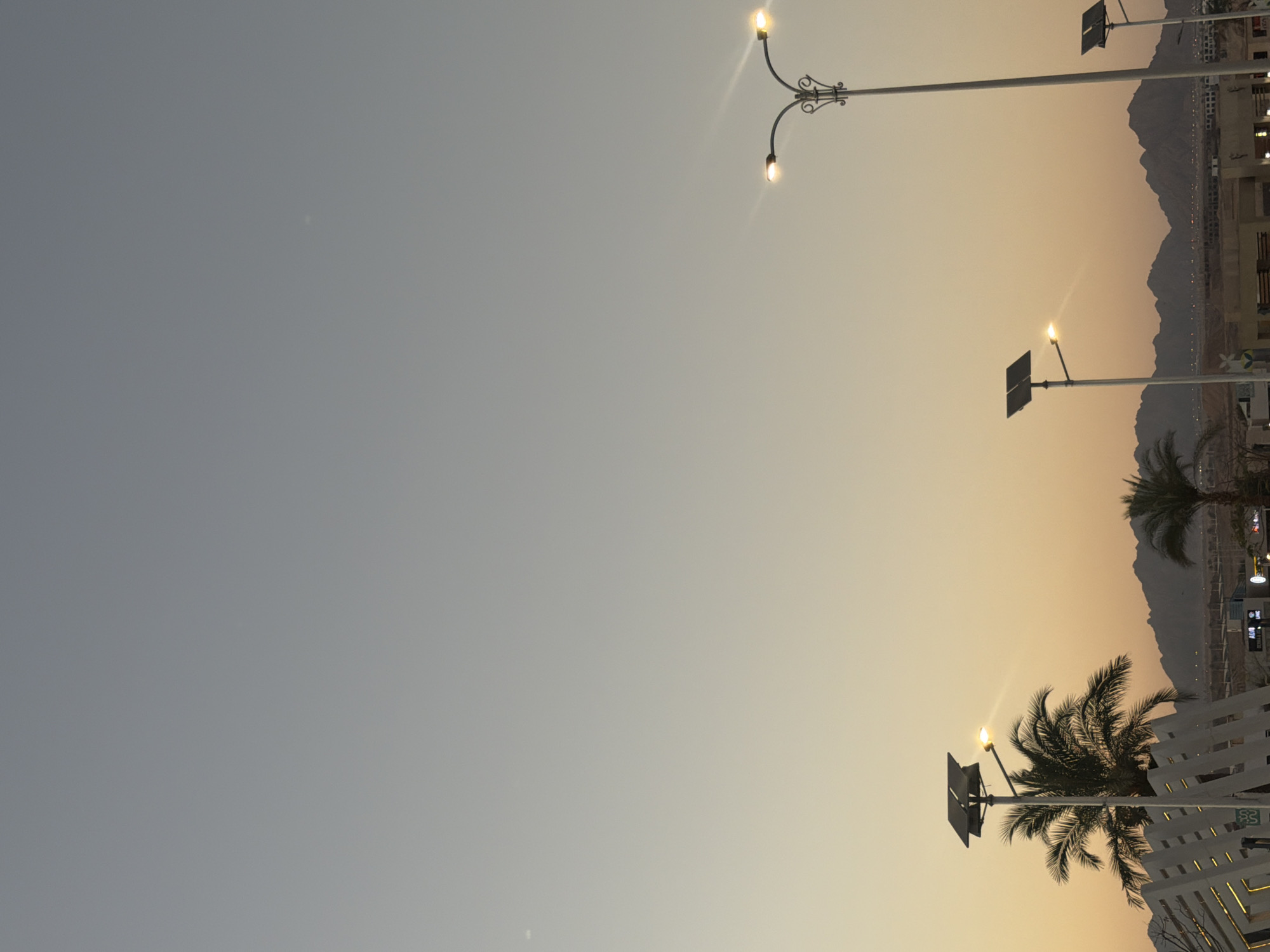 Sharm El Sheikh promenade at dusk, golden hour street life