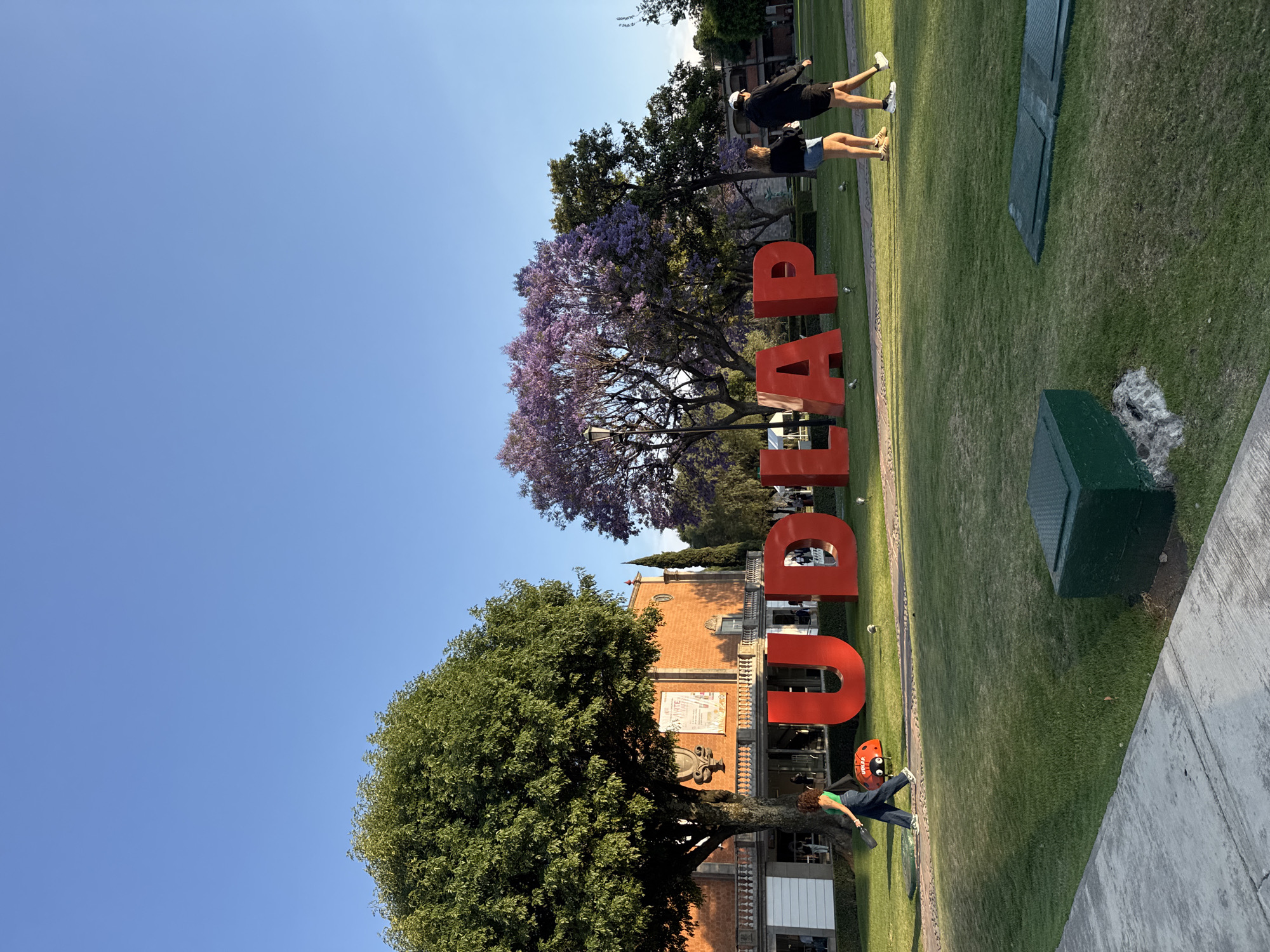 Five people pose for group photo in San Andrés Cholula