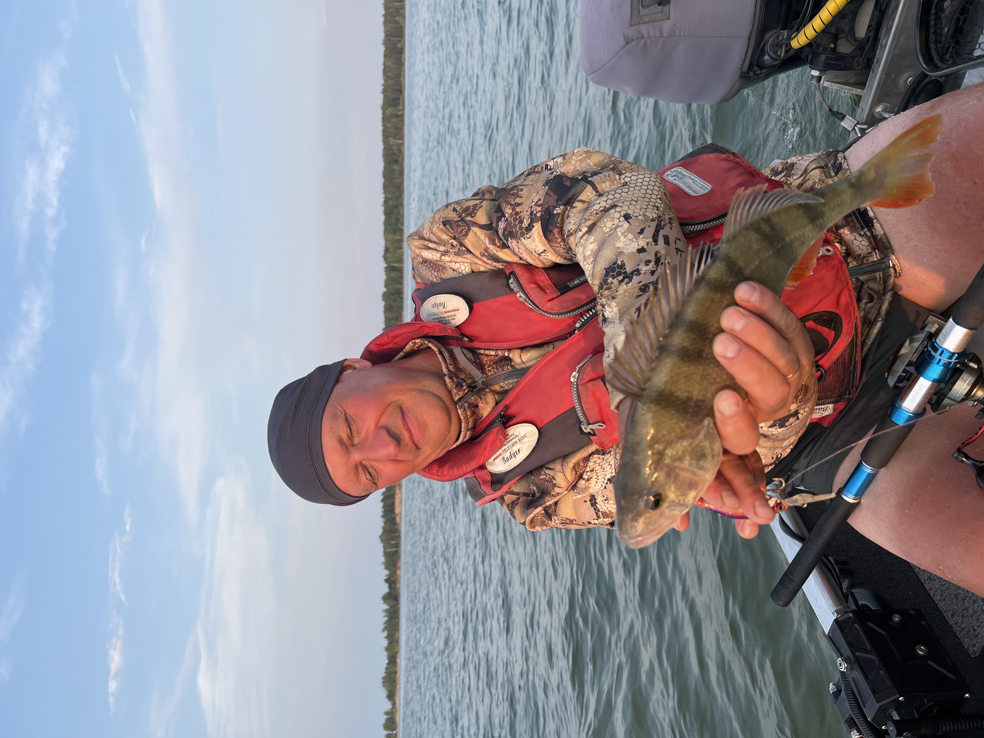 Fishing trip on choppy Russian waters, catches weighed and logged