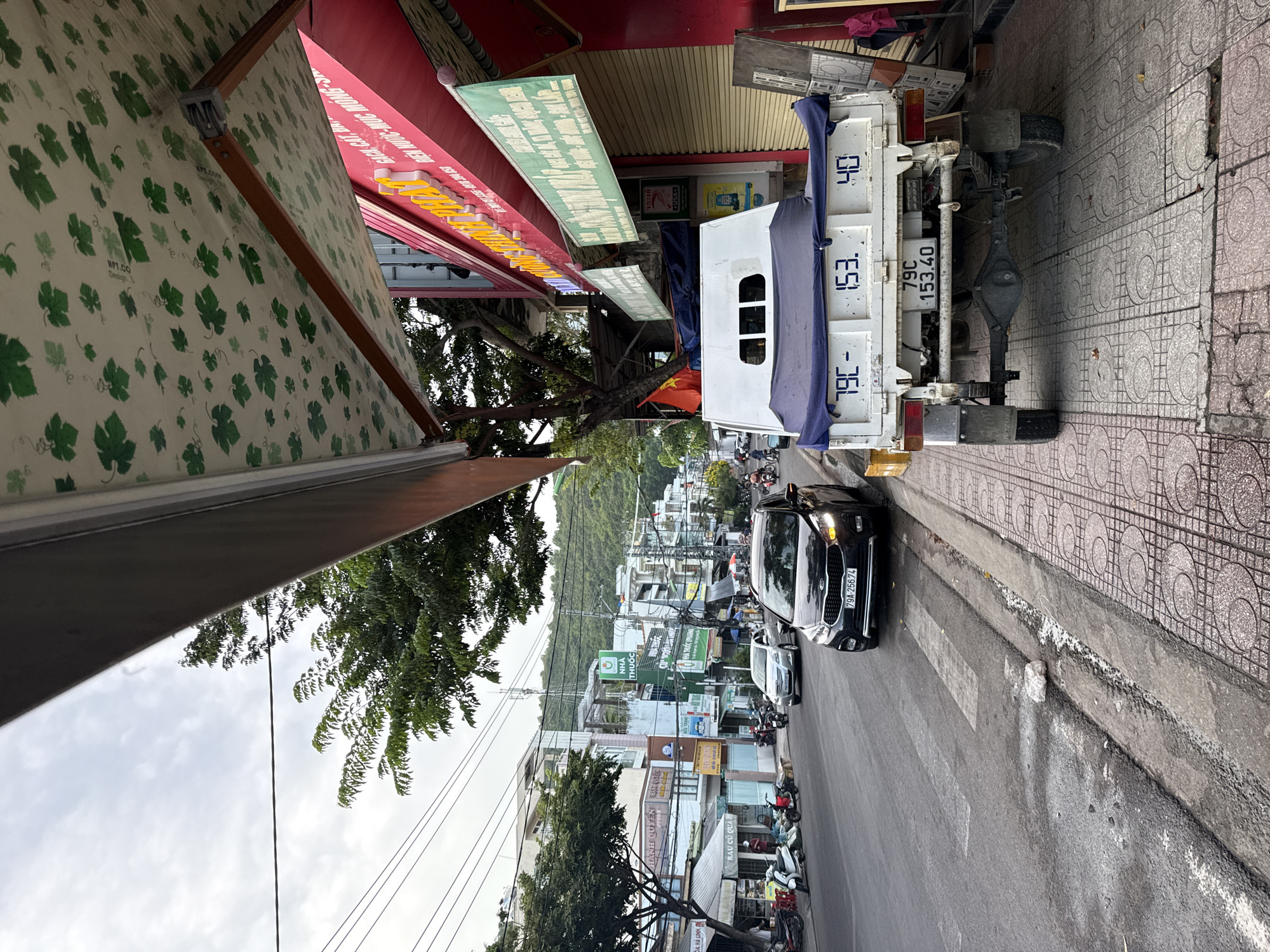 Quiet evening street life along a Nha Trang block