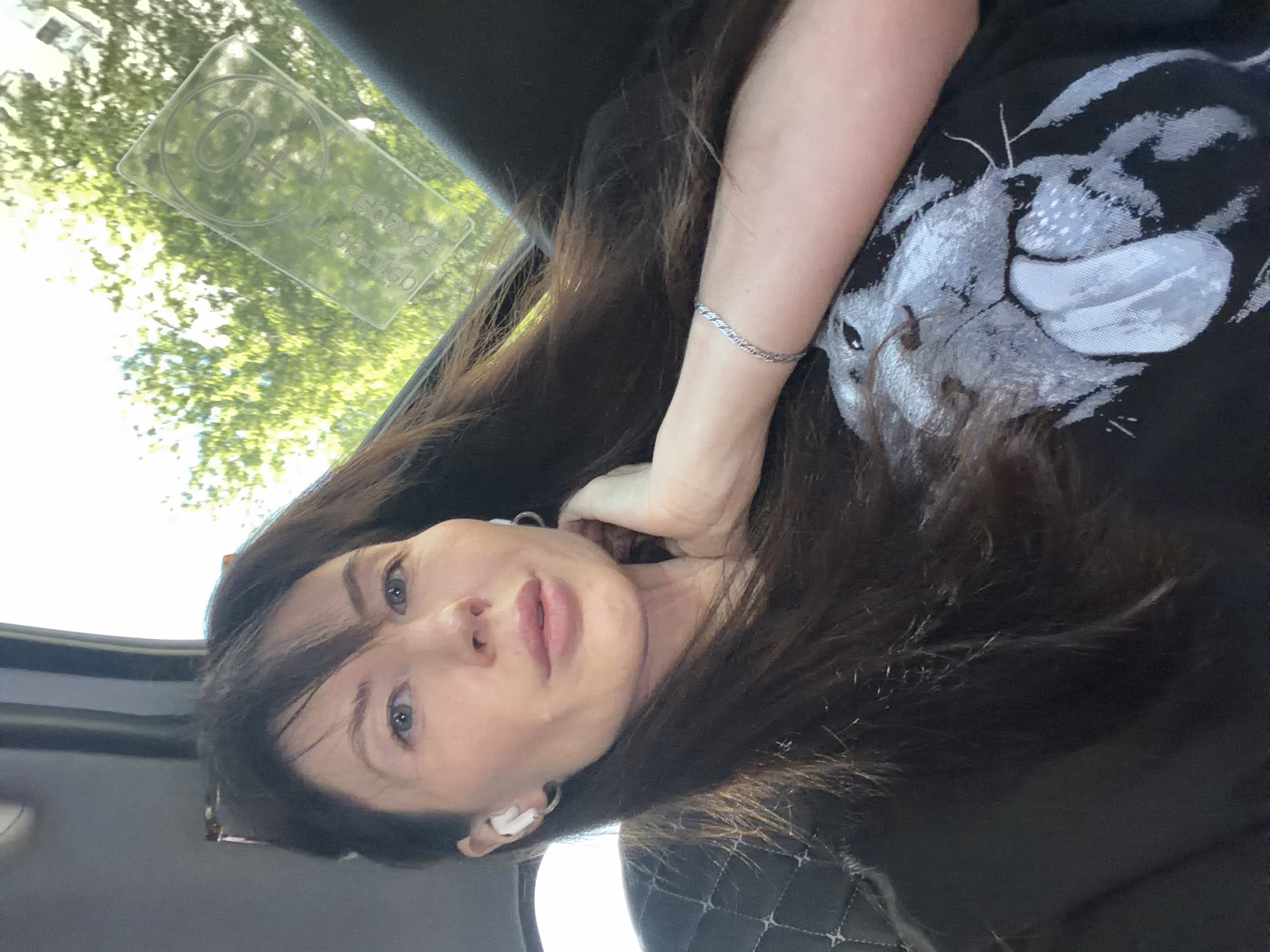 Woman takes selfies in vehicle in Perm, Russia