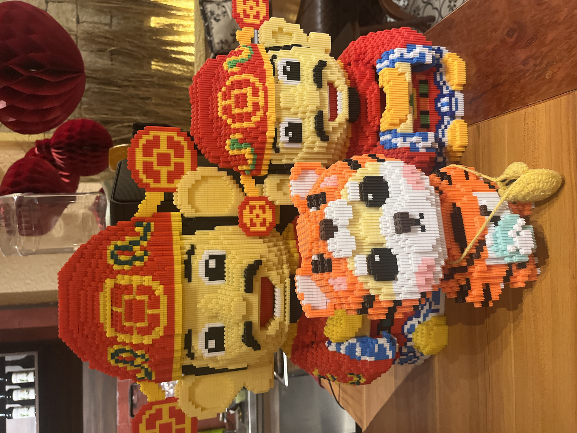 Nha Trang night: beach volleyball, moon, and brick tiger figurines