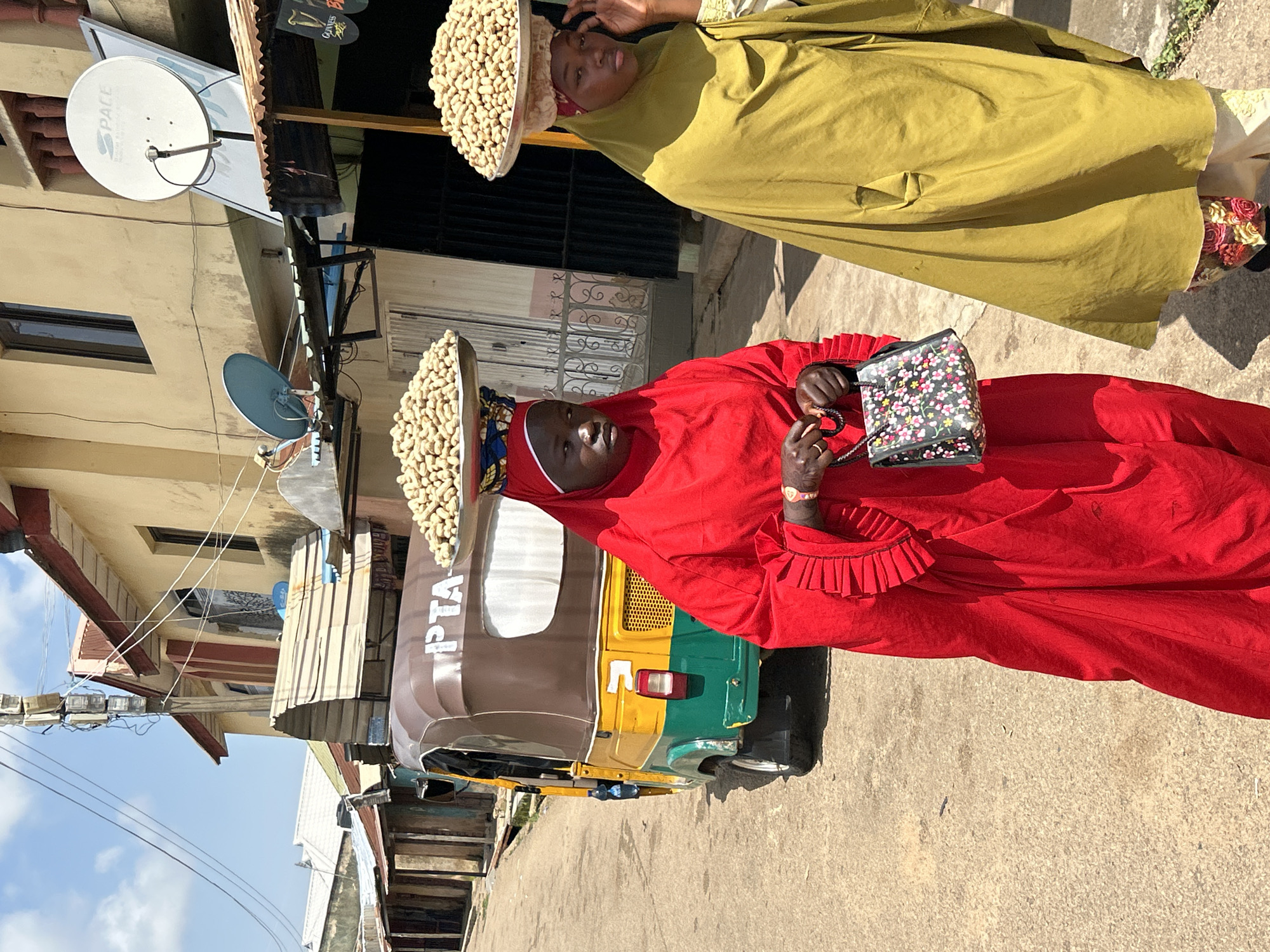Street life in motion on a bright morning in Jos, Nigeria.
