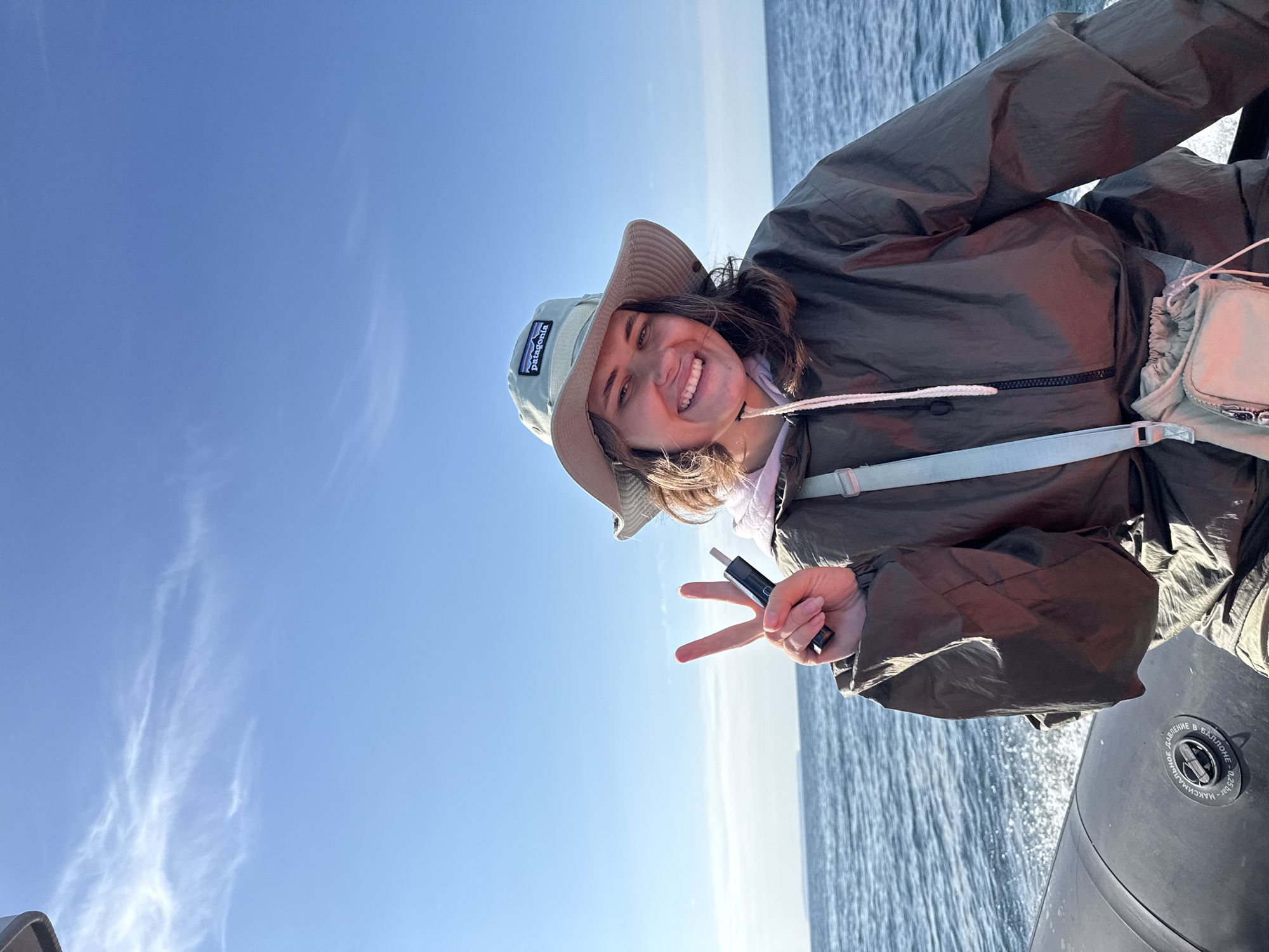 Inflatable boat ride through choppy Arctic waters, Russian coast