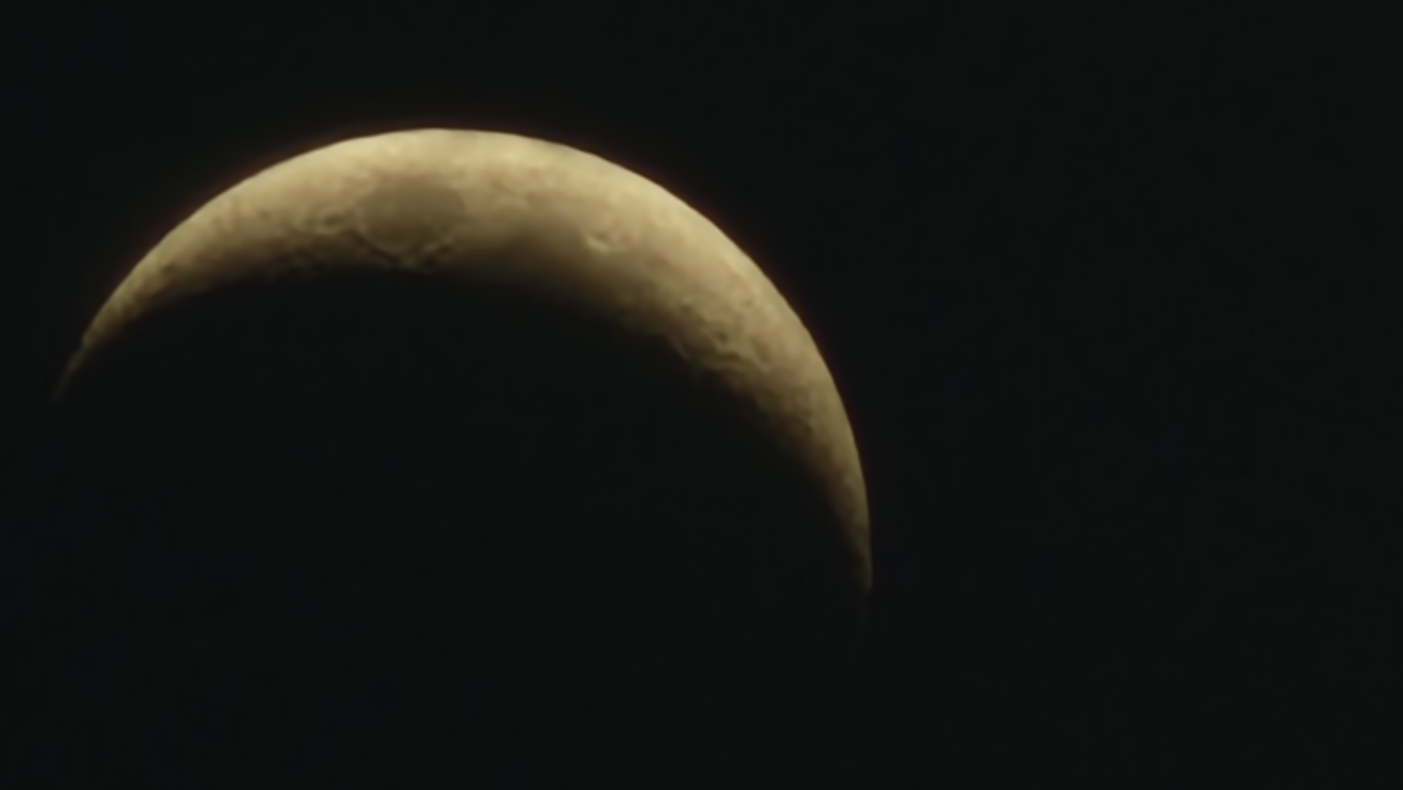 Crescent moon over Yekaterinburg, framed three ways at dusk
