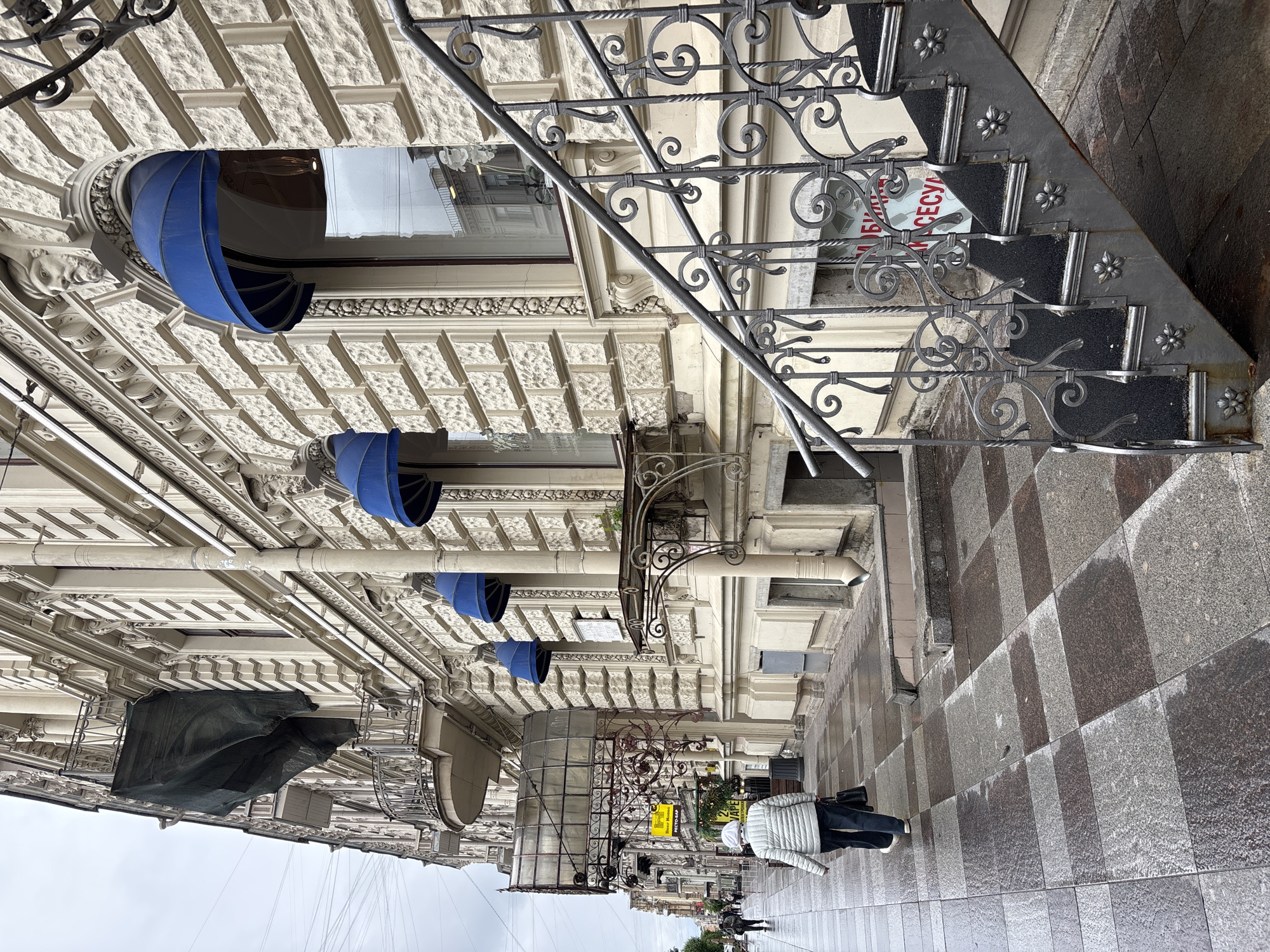 Rainy morning walk documented on Saint Petersburg's Chaikovskogo Street