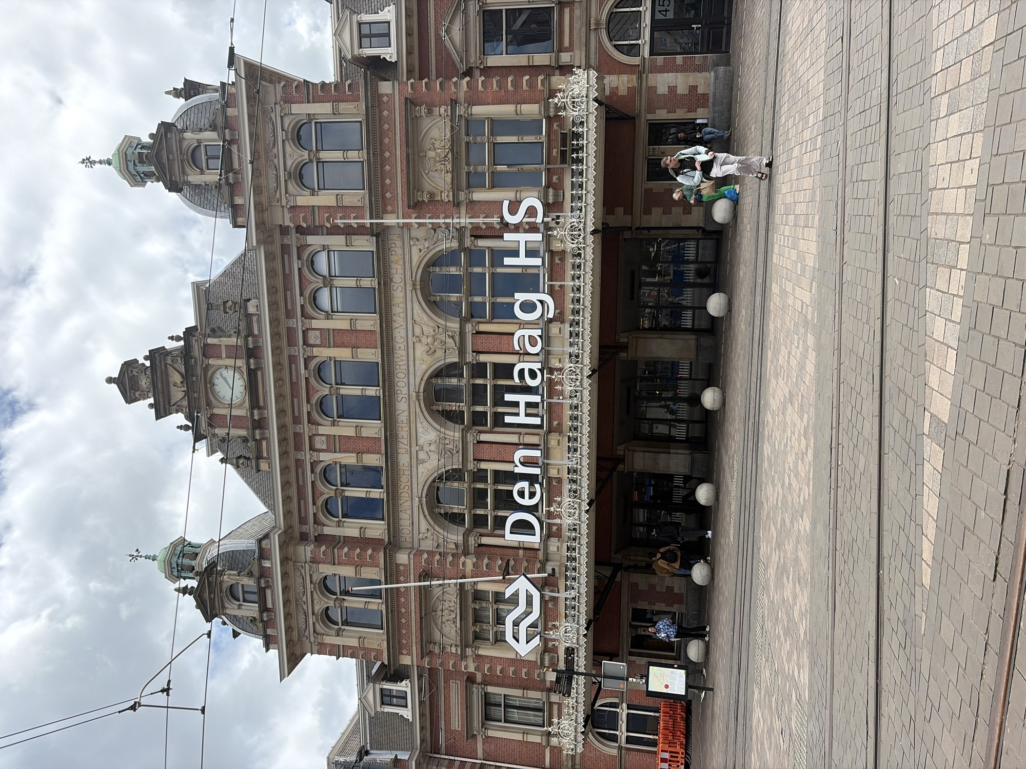 Tourist documentation captures The Hague's architectural contrasts near central station