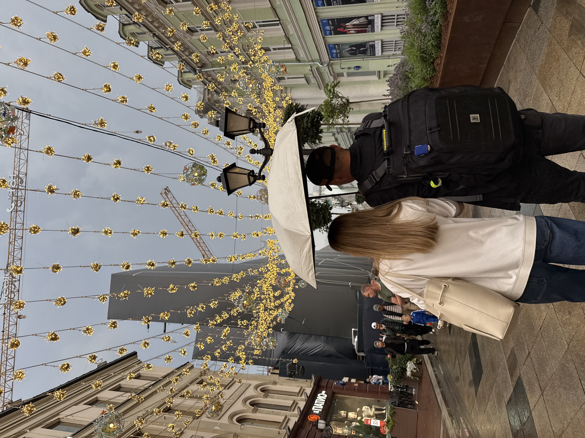 Rainy afternoon in central Moscow, street life in full swing