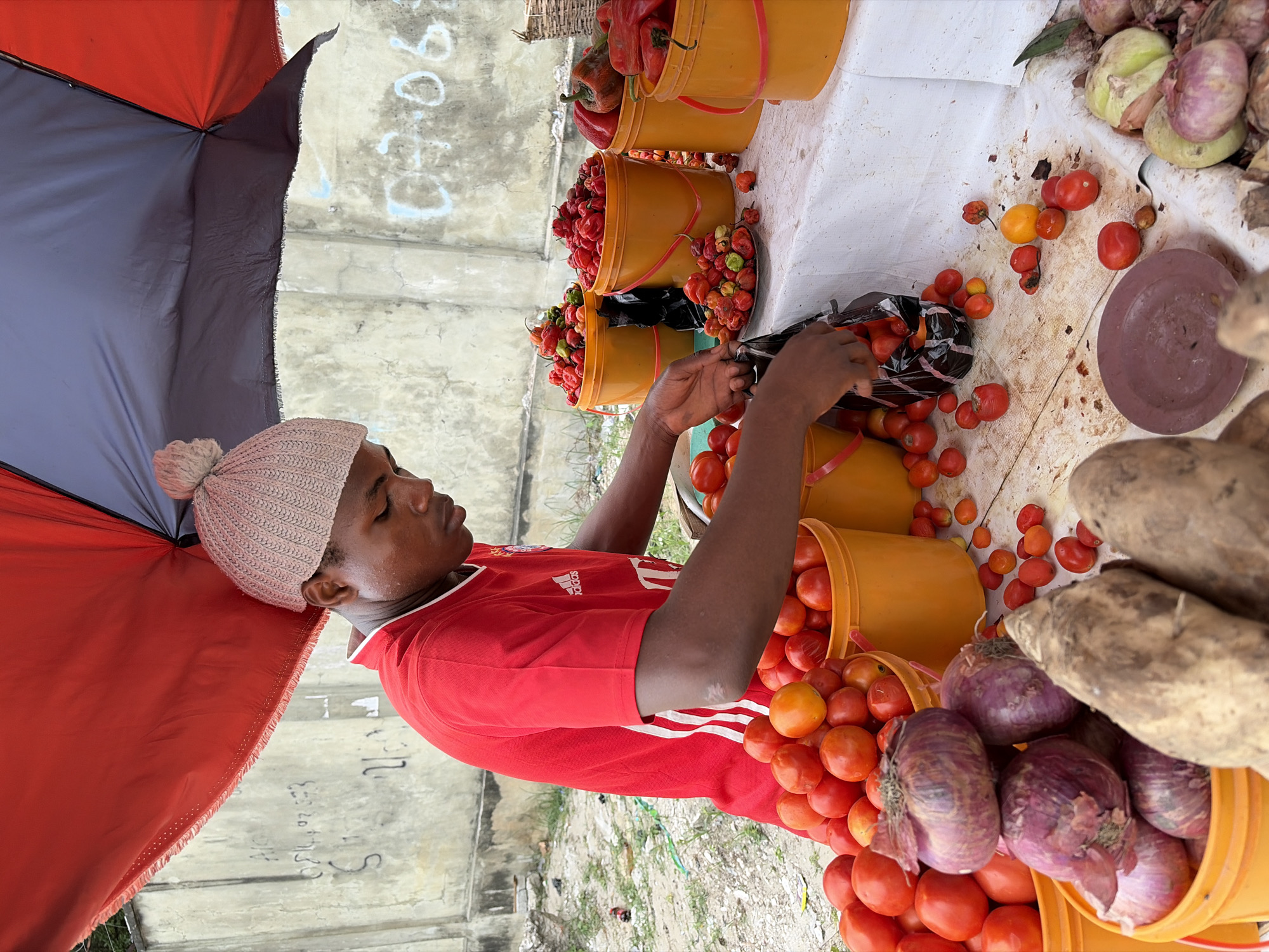 Daily market and repair shop activity in Igboefon, Nigeria
