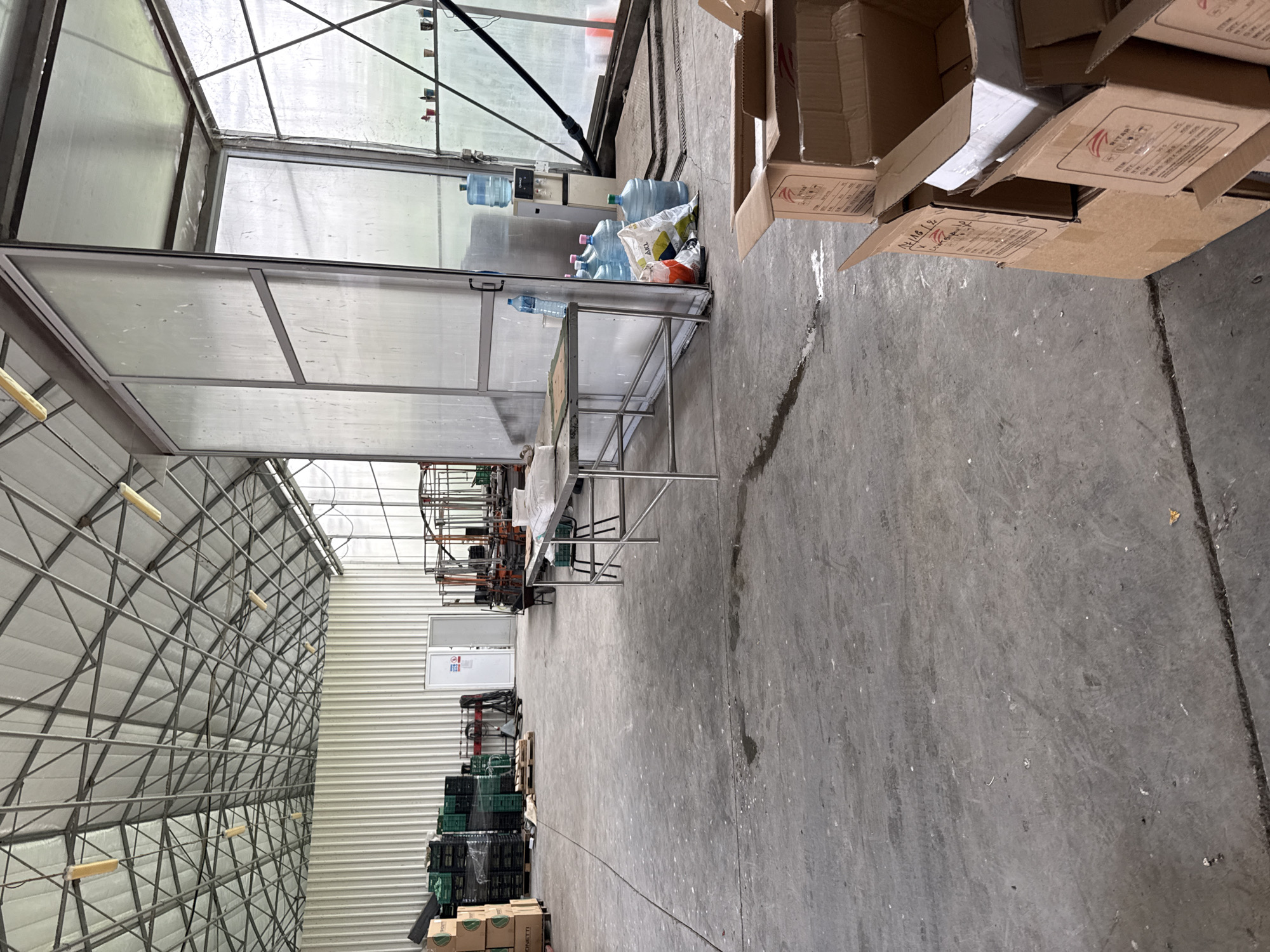 Worker documents greenhouse operations in Stara Zagora facility