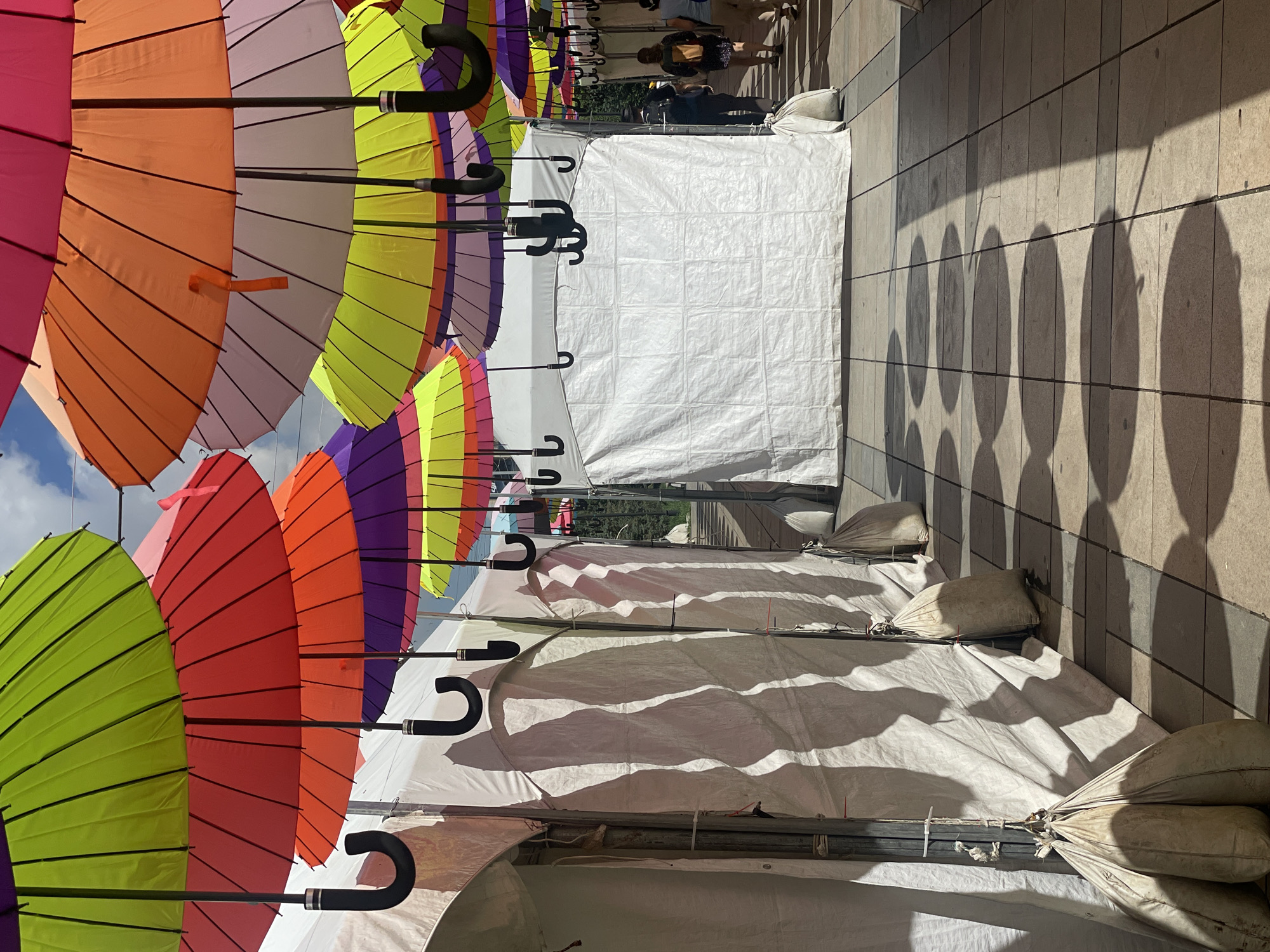 Ulaanbaatar street-level scenes: scooters, markets, and city textures