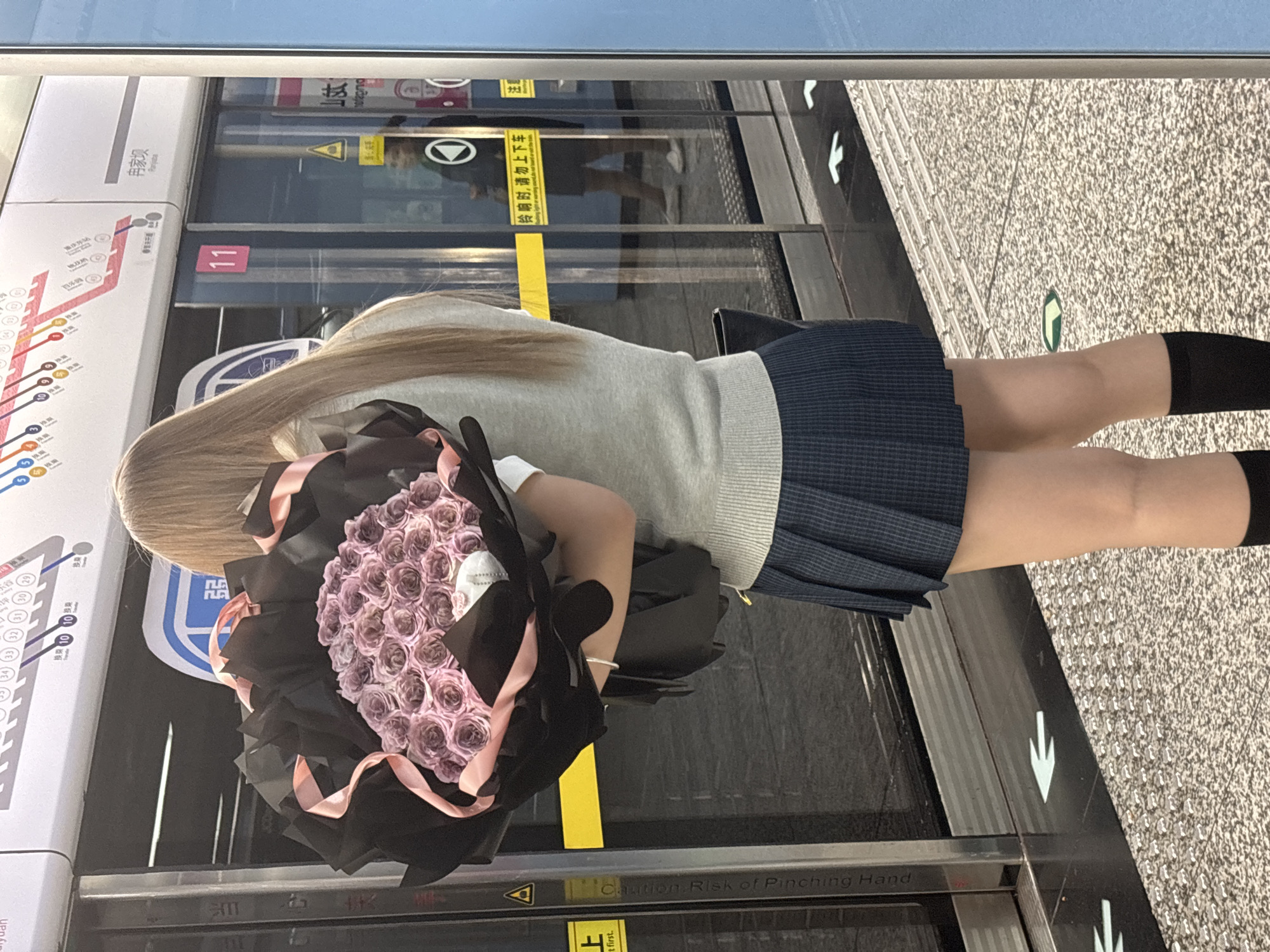 Blonde-haired commuter spotted at Liangjiang subway station