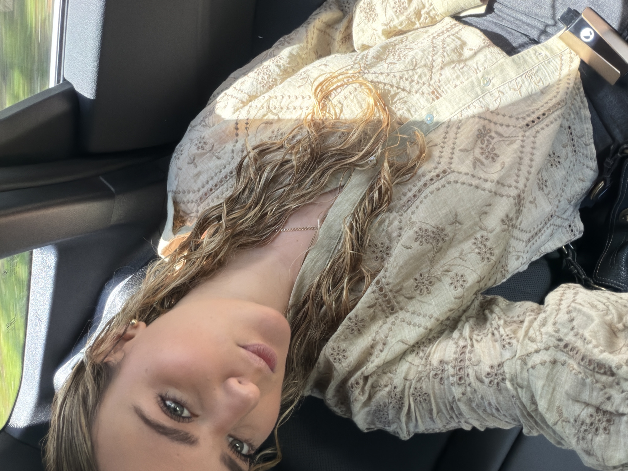 Woman takes car selfie in Key Biscayne