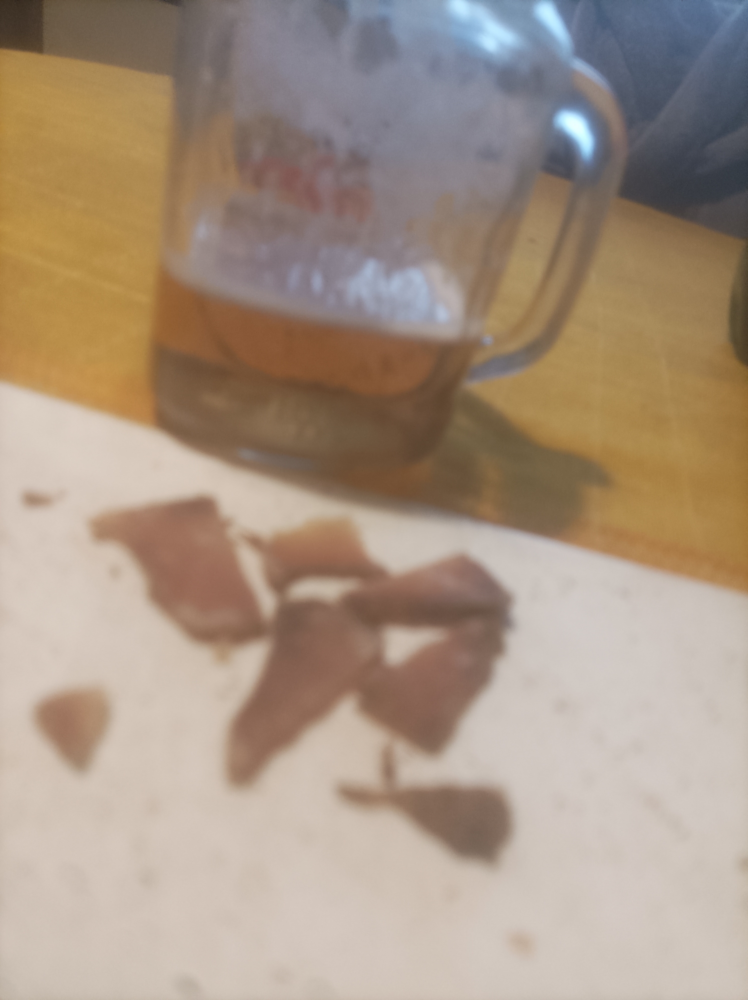 Beer and jerky snack observed on table in Burgas
