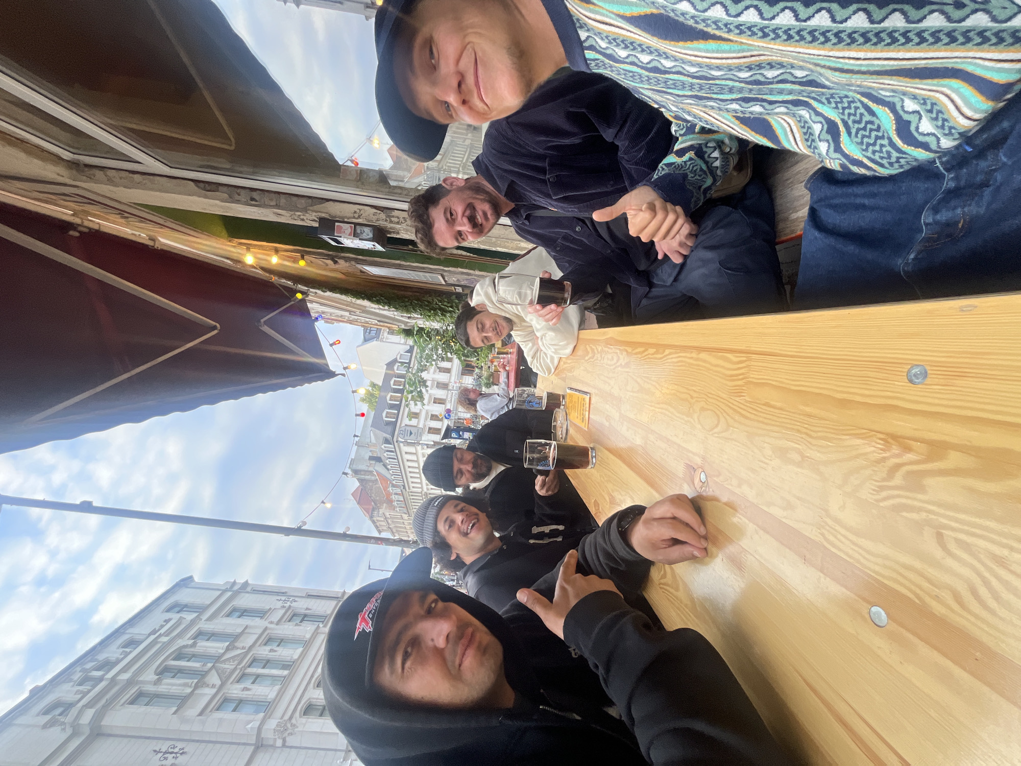 Indian dinner gathering at outdoor Berlin restaurant