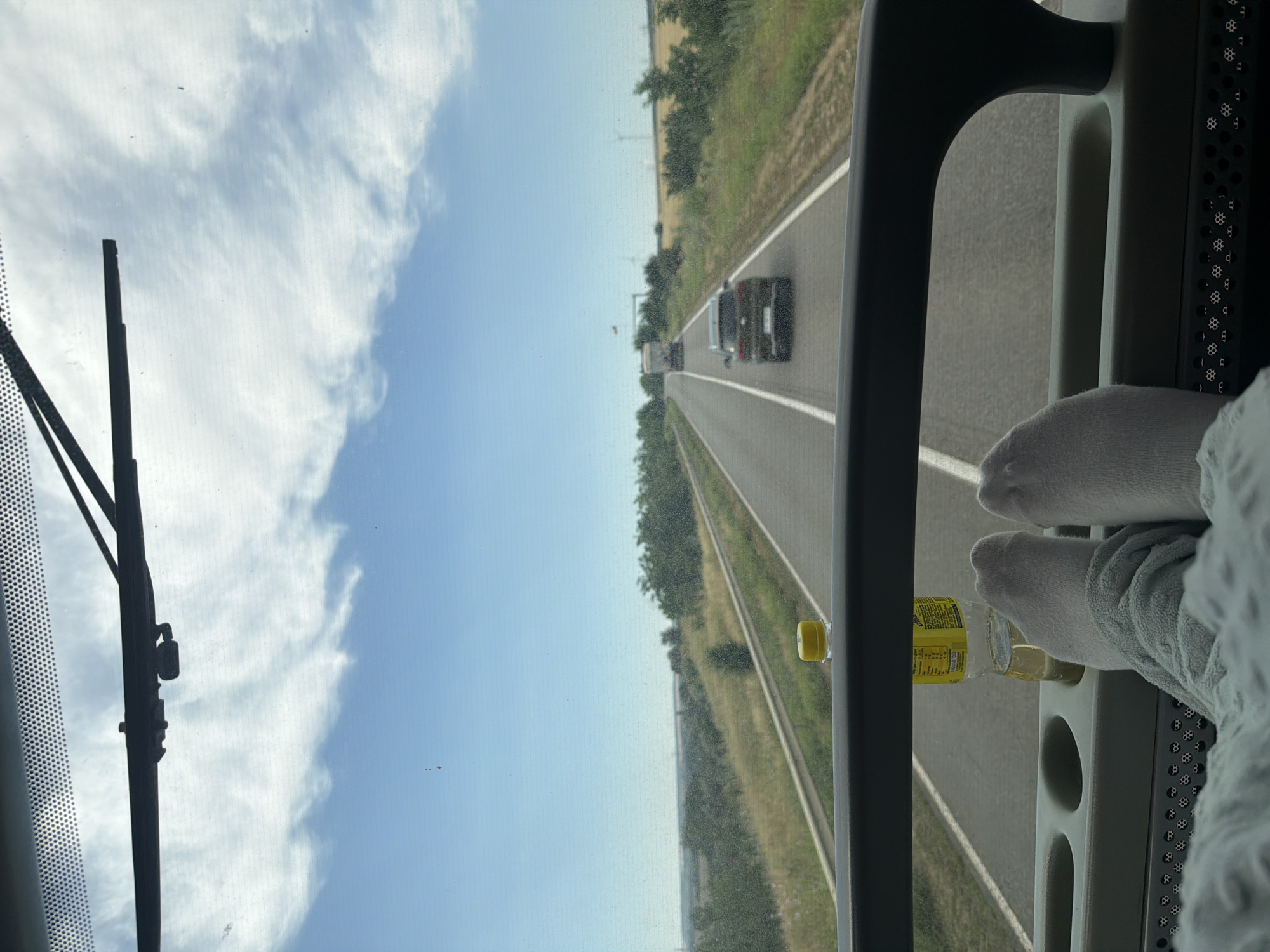 Bus ride through Palanca, Moldova, feet up on the dash