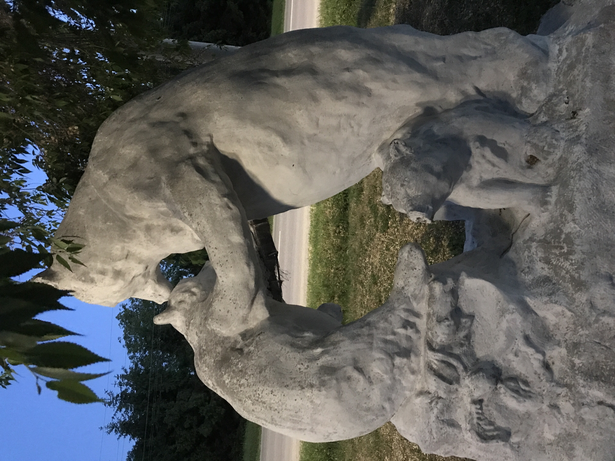 Evening scenes documented in Lanivtsi, Ukraine including lion sculpture