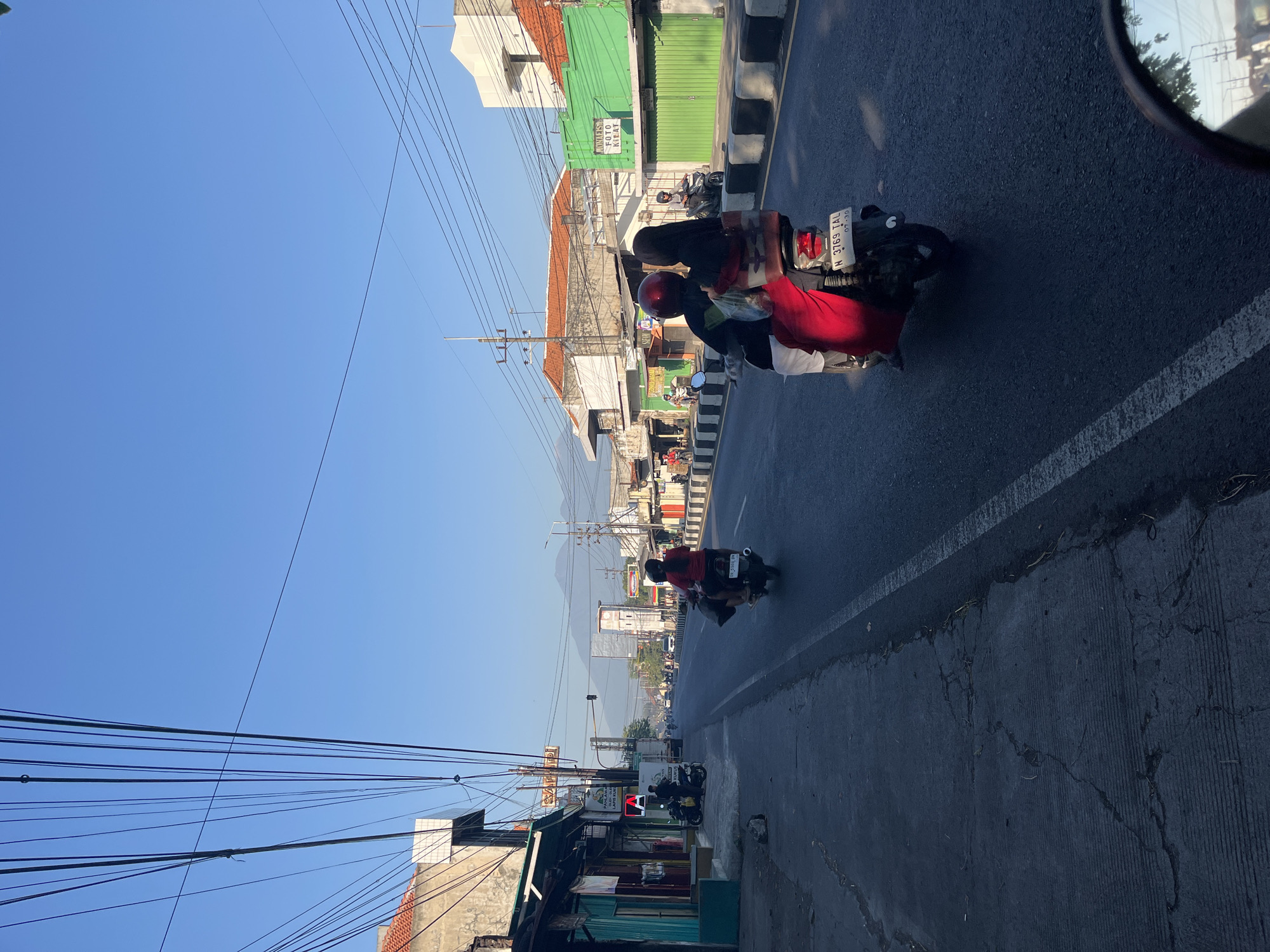 Morning traffic and street life along the Porong-Mindi corridor