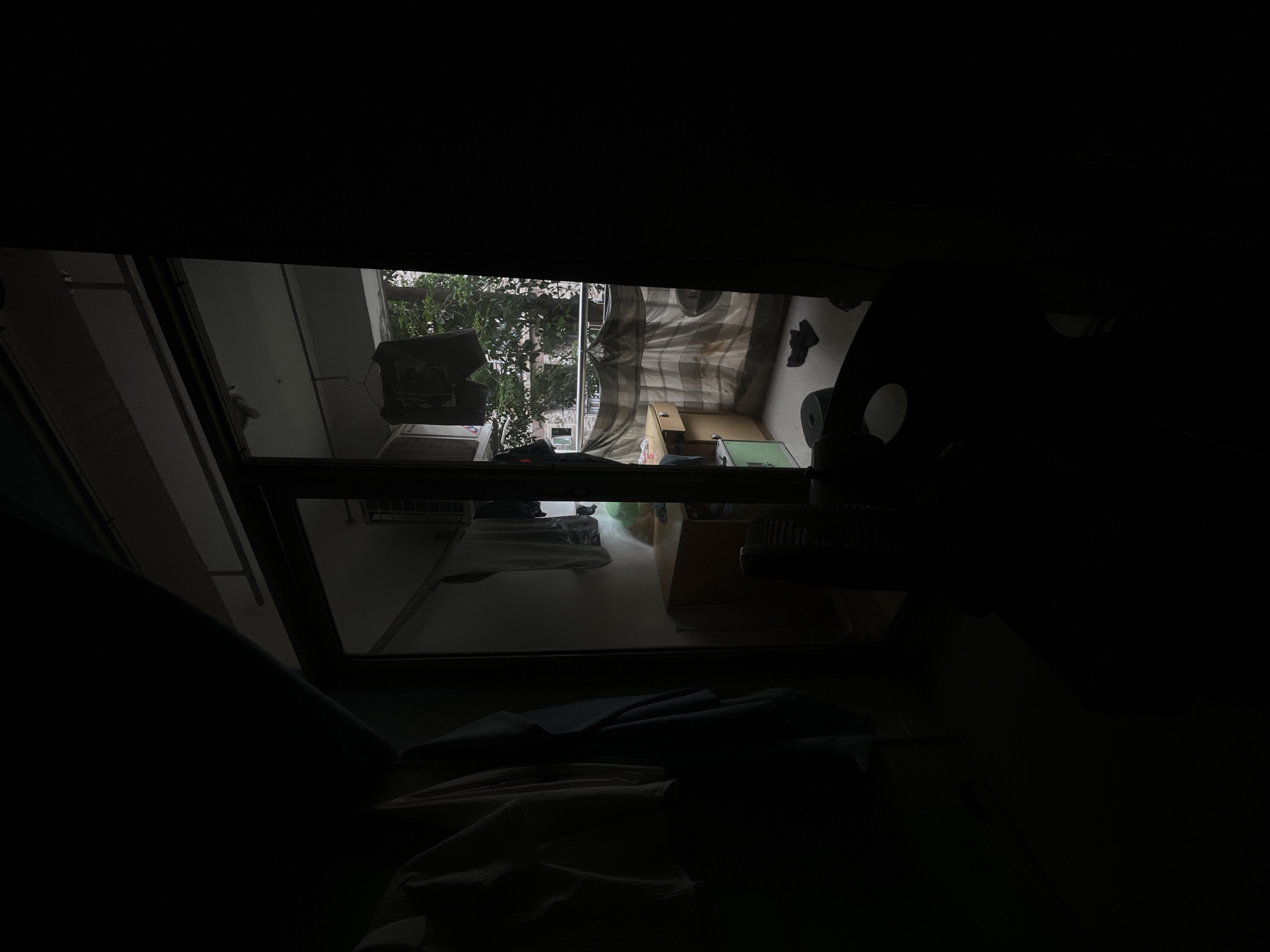 Dimly lit room interior captured in Yuzhong District