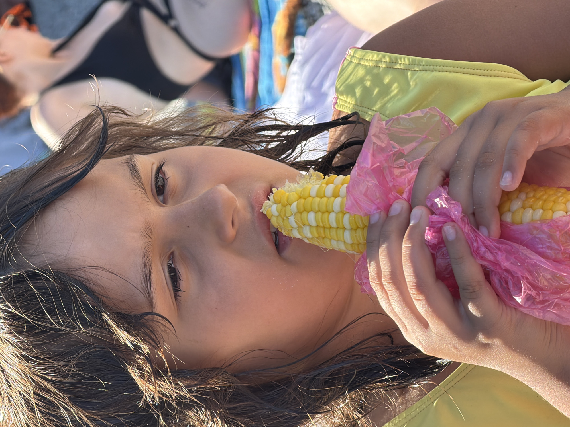 Summer afternoon on the Partenit pier: swimming, jumping, corn