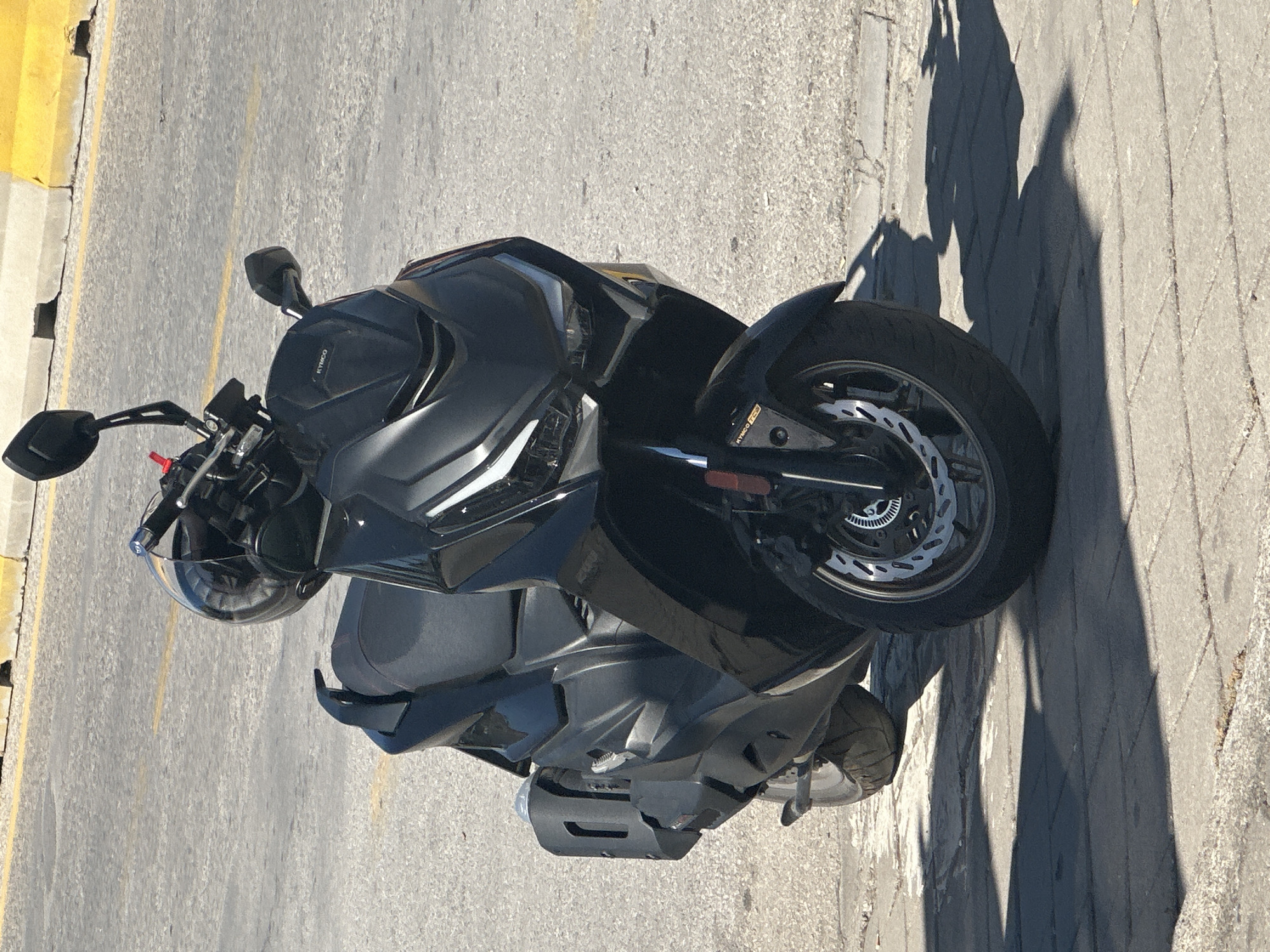 Motorcycle inspection routine documented in Fethiye, Turkey