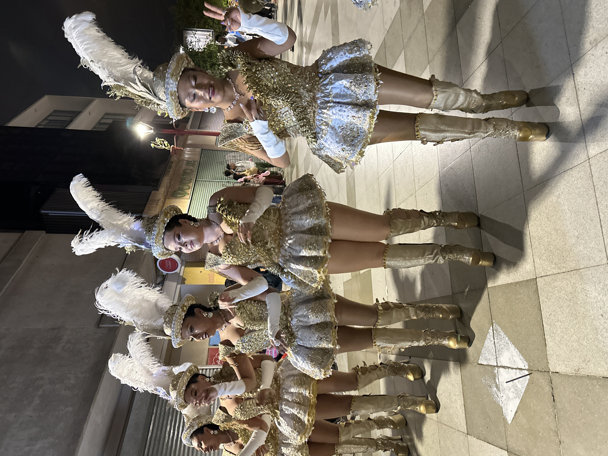 Elaborately costumed performers take the stage in Arica, Chile