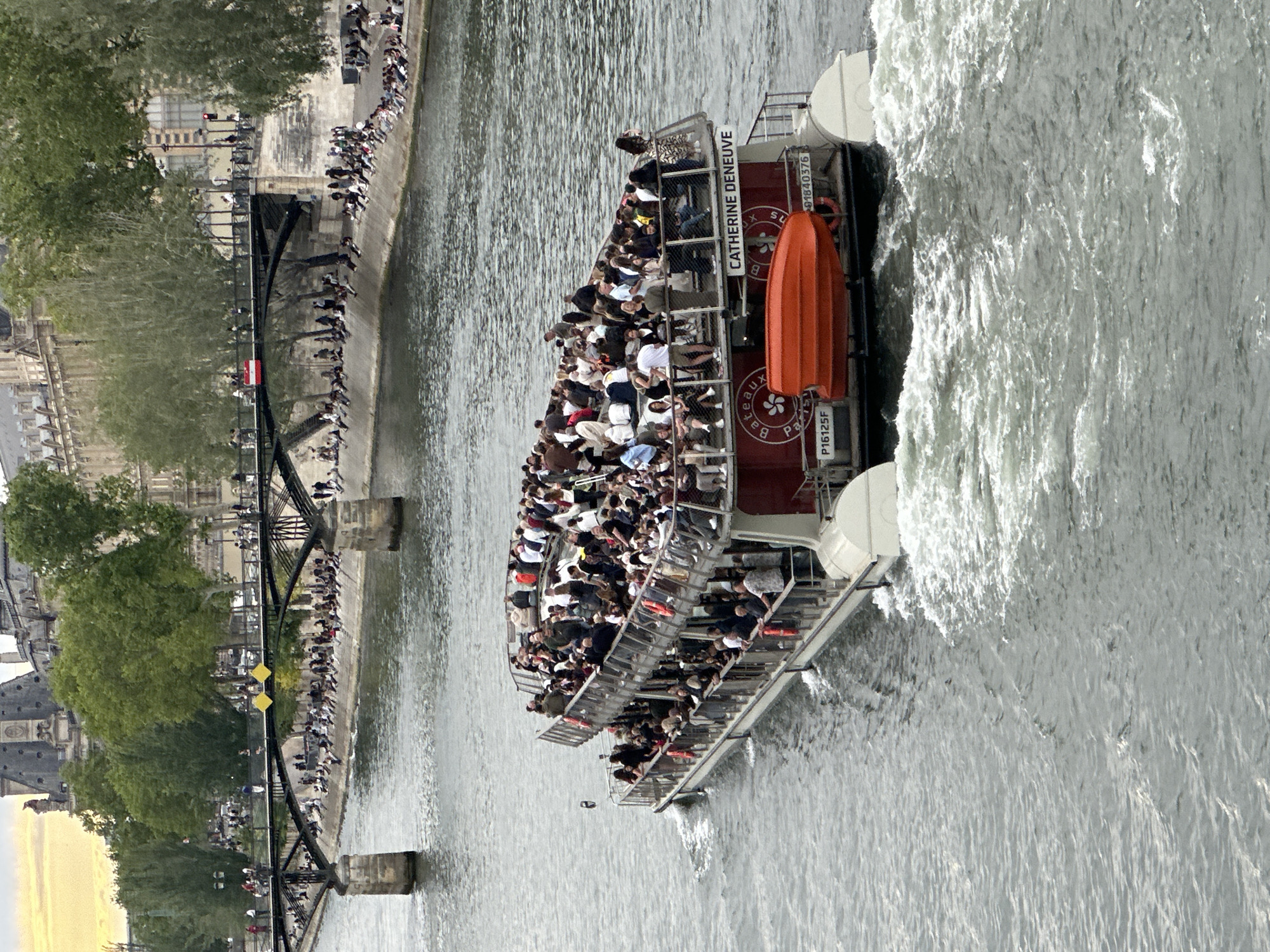 Seine river tour and street food vendor in Paris