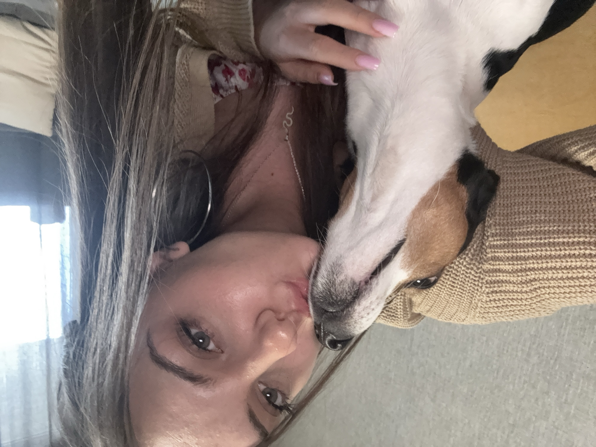 Woman photographs playful moments with Jack Russell Terrier in Sofia