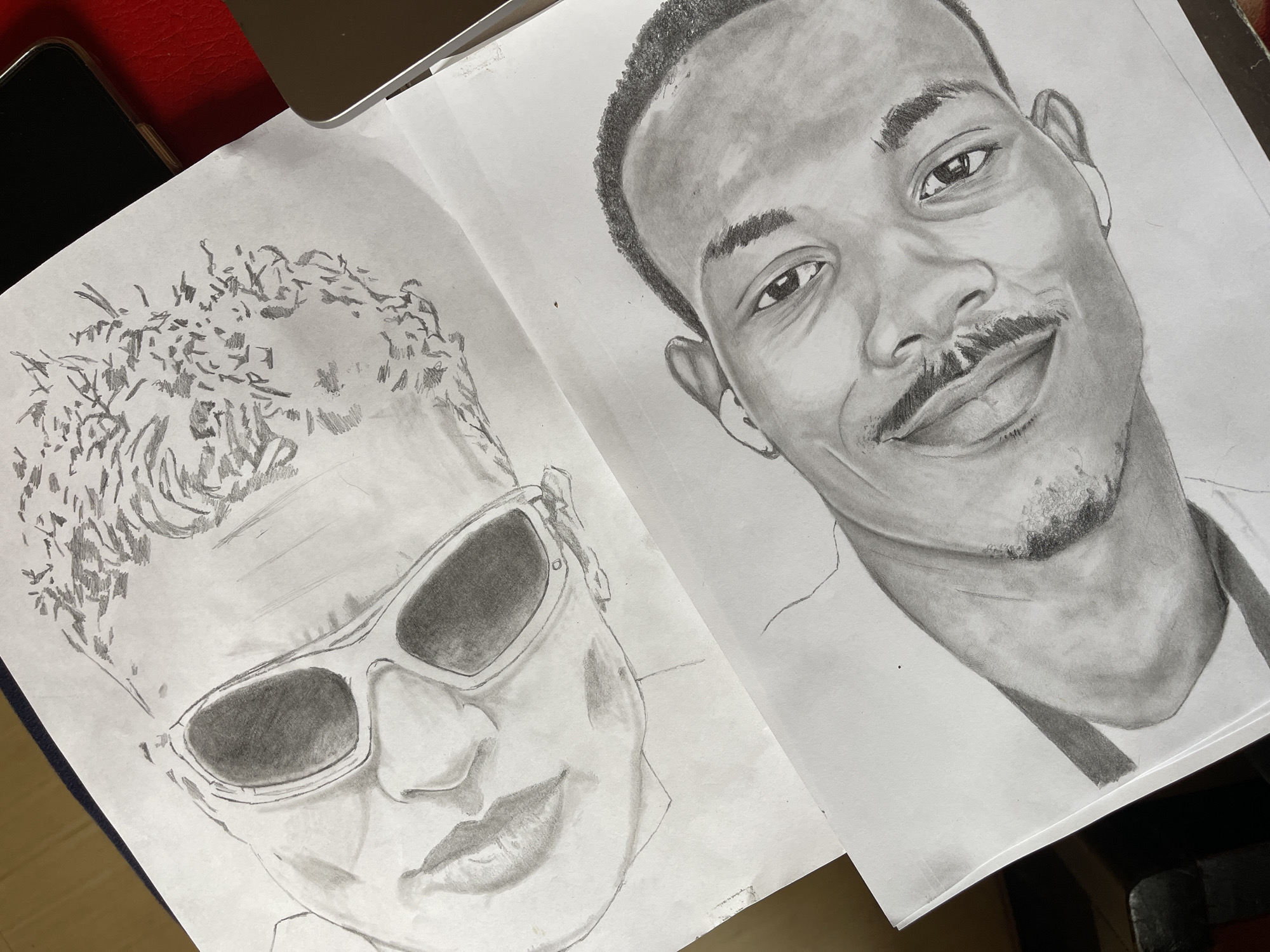 Ballpoint pen portrait sketches documented in Jos, Nigeria