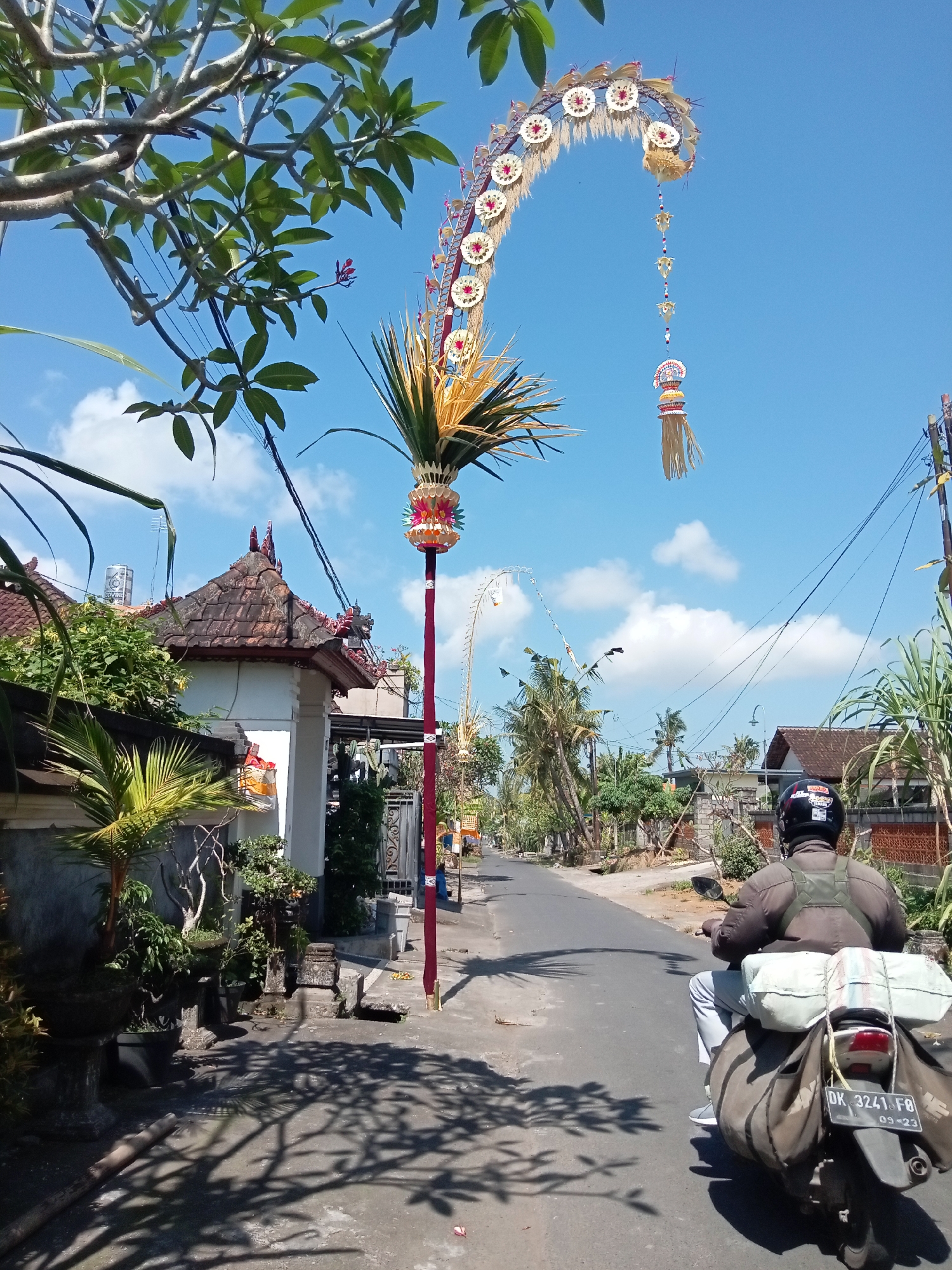 Everyday street scenes around a ceremonial site in Blahbatuh, Bali
