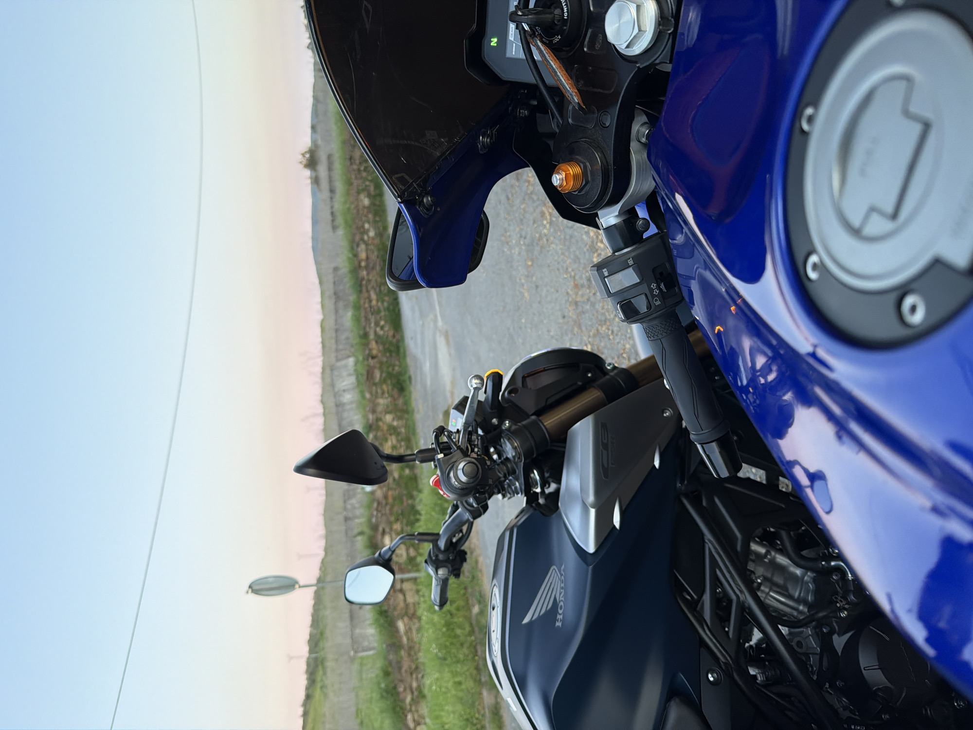 Motorcycle group ride through Mirandela Portugal at sunset